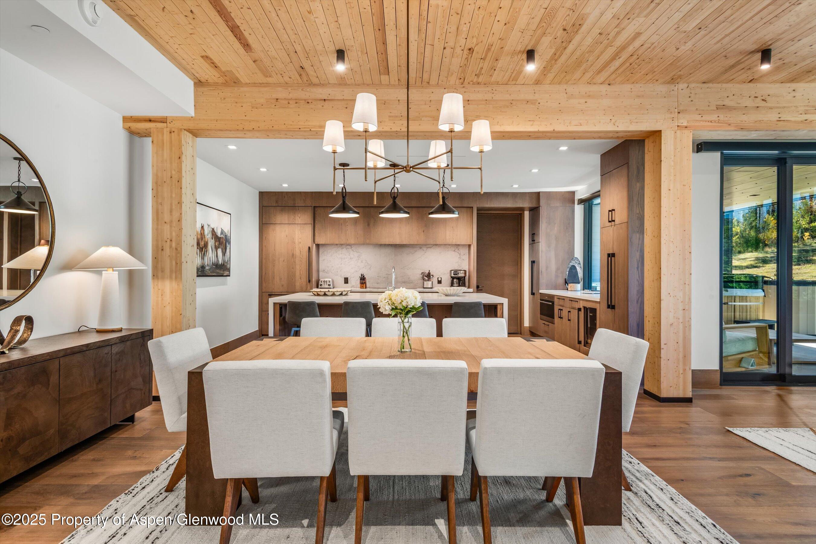 180 Wood Road, Unit 404 Snowmass Village, CO 81615 - Photo 26 of 51 404 dining and kitchenb