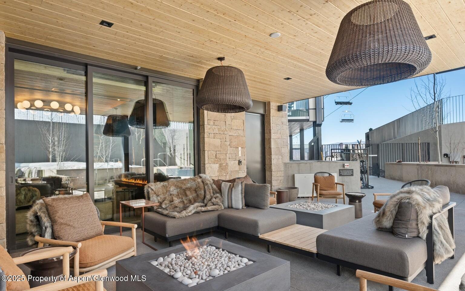 180 Wood Road, Unit 404 Snowmass Village, CO 81615 - Photo 29 of 51 404 exterior lounge