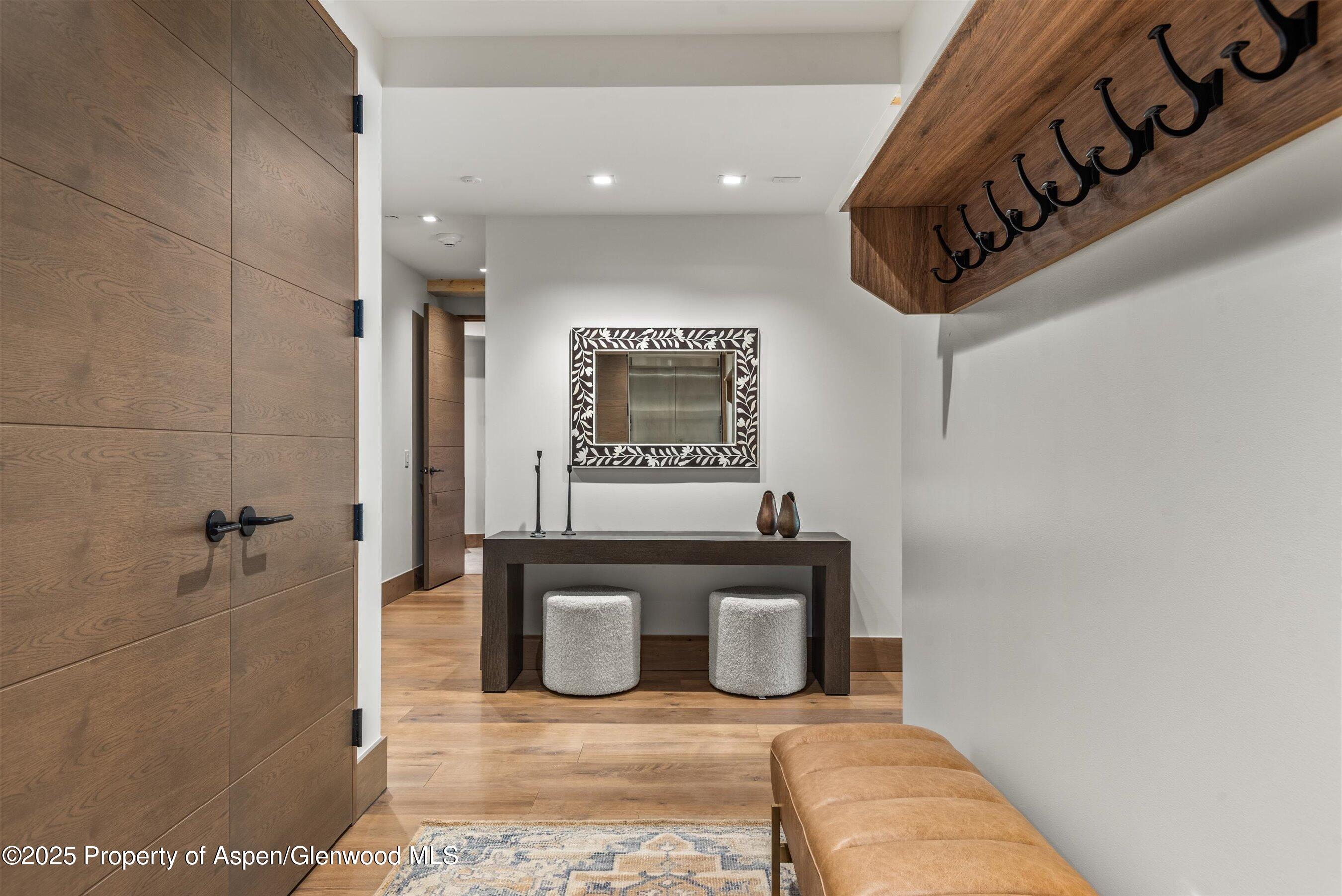 180 Wood Road, Unit 404 Snowmass Village, CO 81615 - Photo 30 of 51 a bathroom with a bathtub and a shower