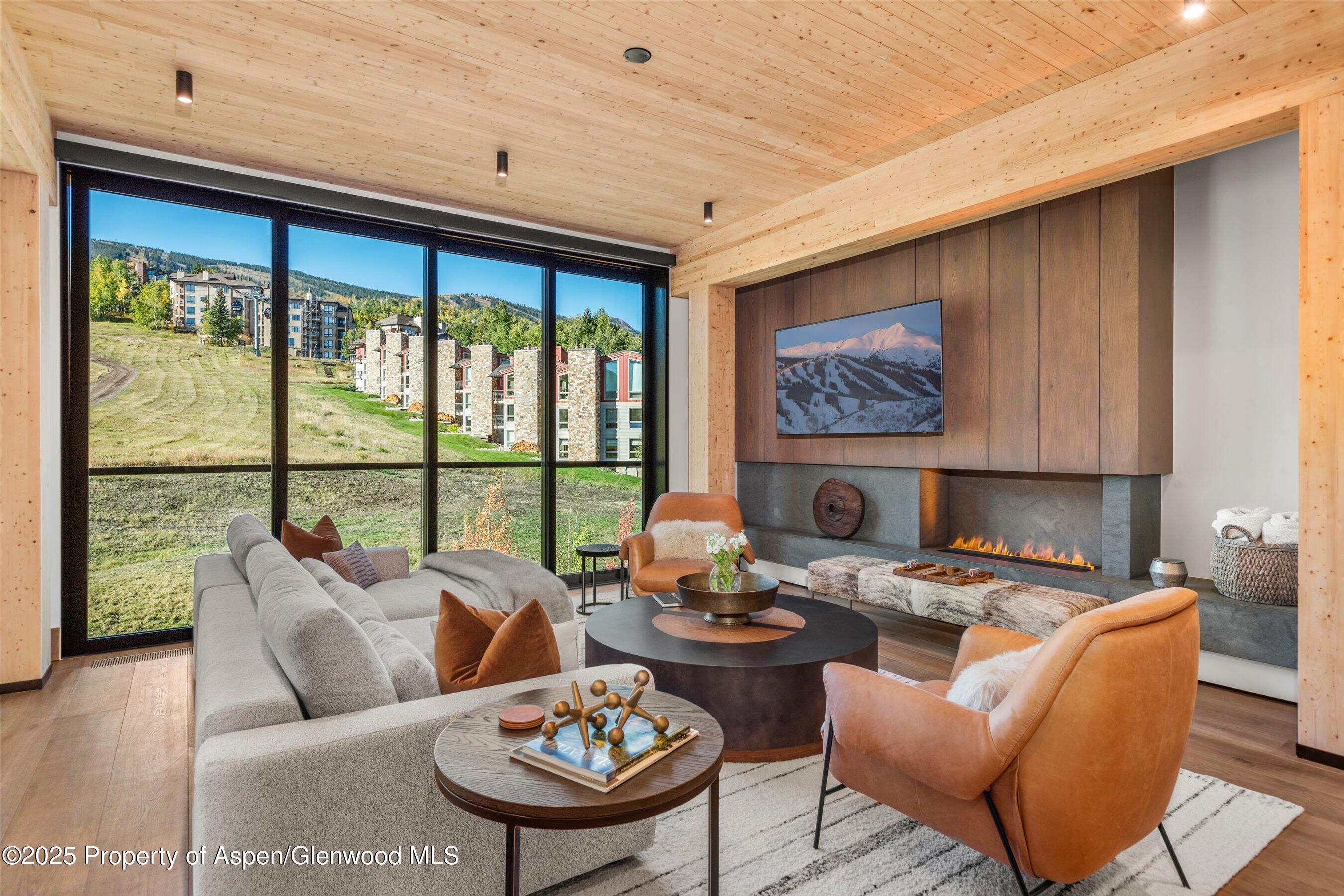180 Wood Road, Unit 404 Snowmass Village, CO 81615 - Photo 3 of 51 404 living roomc