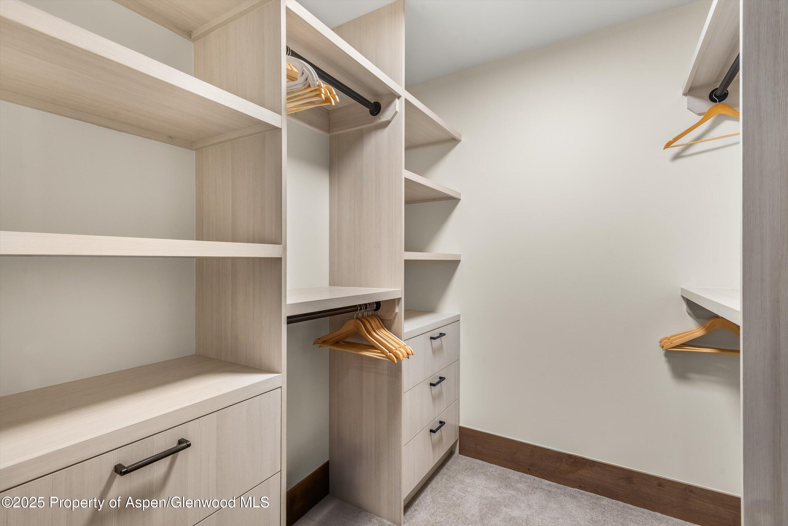 180 Wood Road, Unit 404 Snowmass Village, CO 81615 - Photo 38 of 51 404 master walk-in closeta