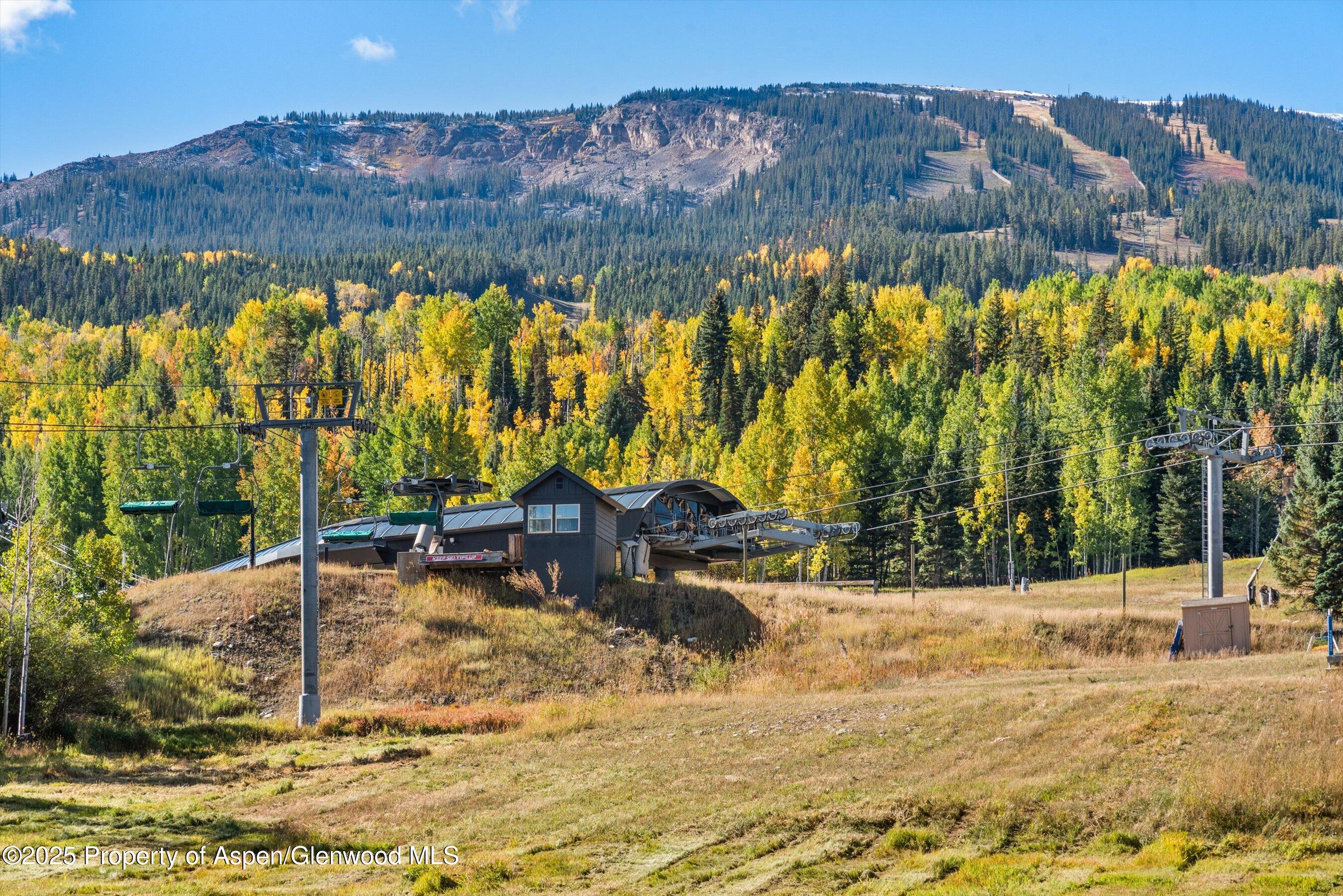 180 Wood Road, Unit 404 Snowmass Village, CO 81615 - Photo 45 of 51 404 view from deck of high alpine