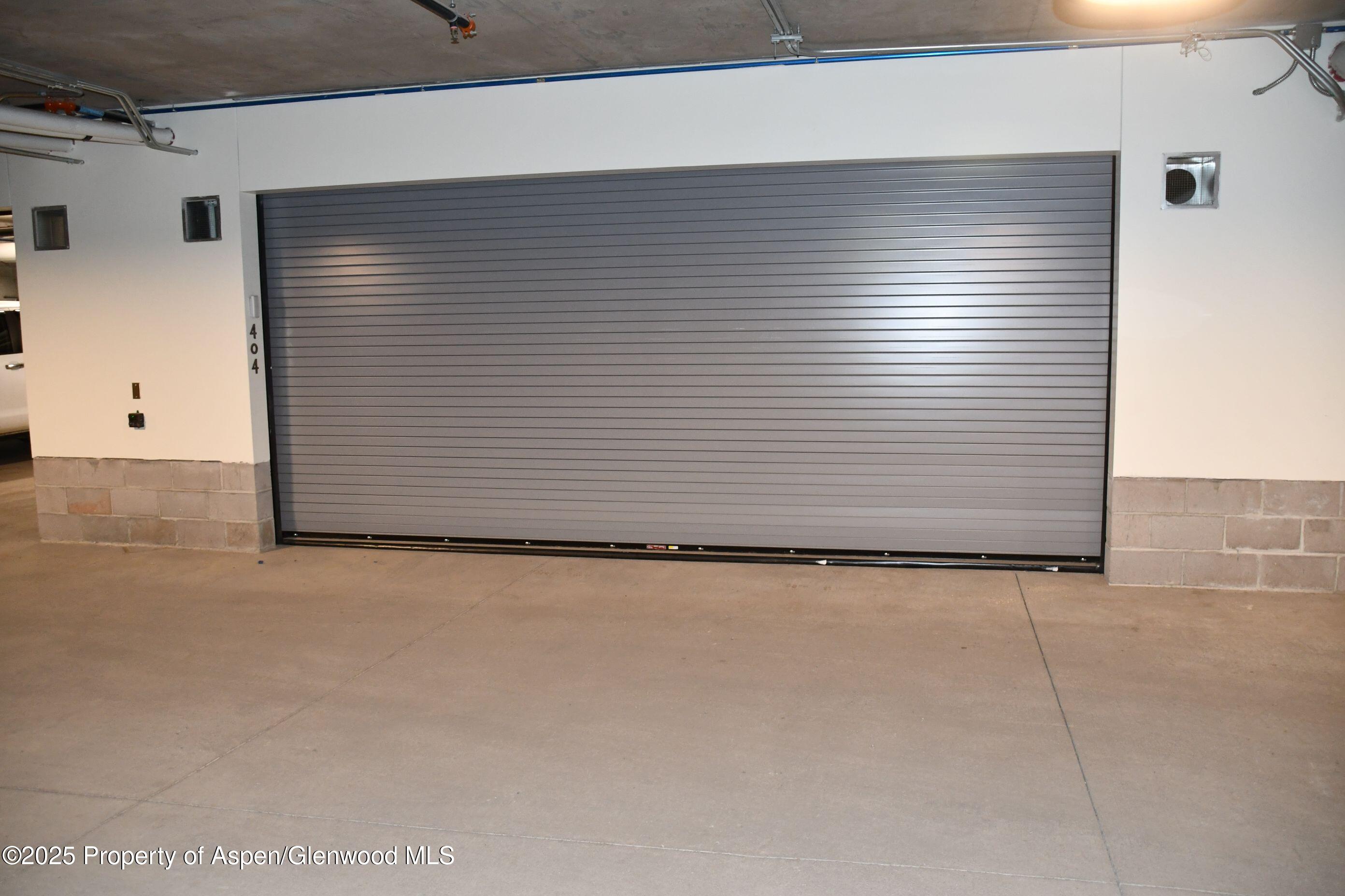180 Wood Road, Unit 404 Snowmass Village, CO 81615 - Photo 49 of 51 404 garage1