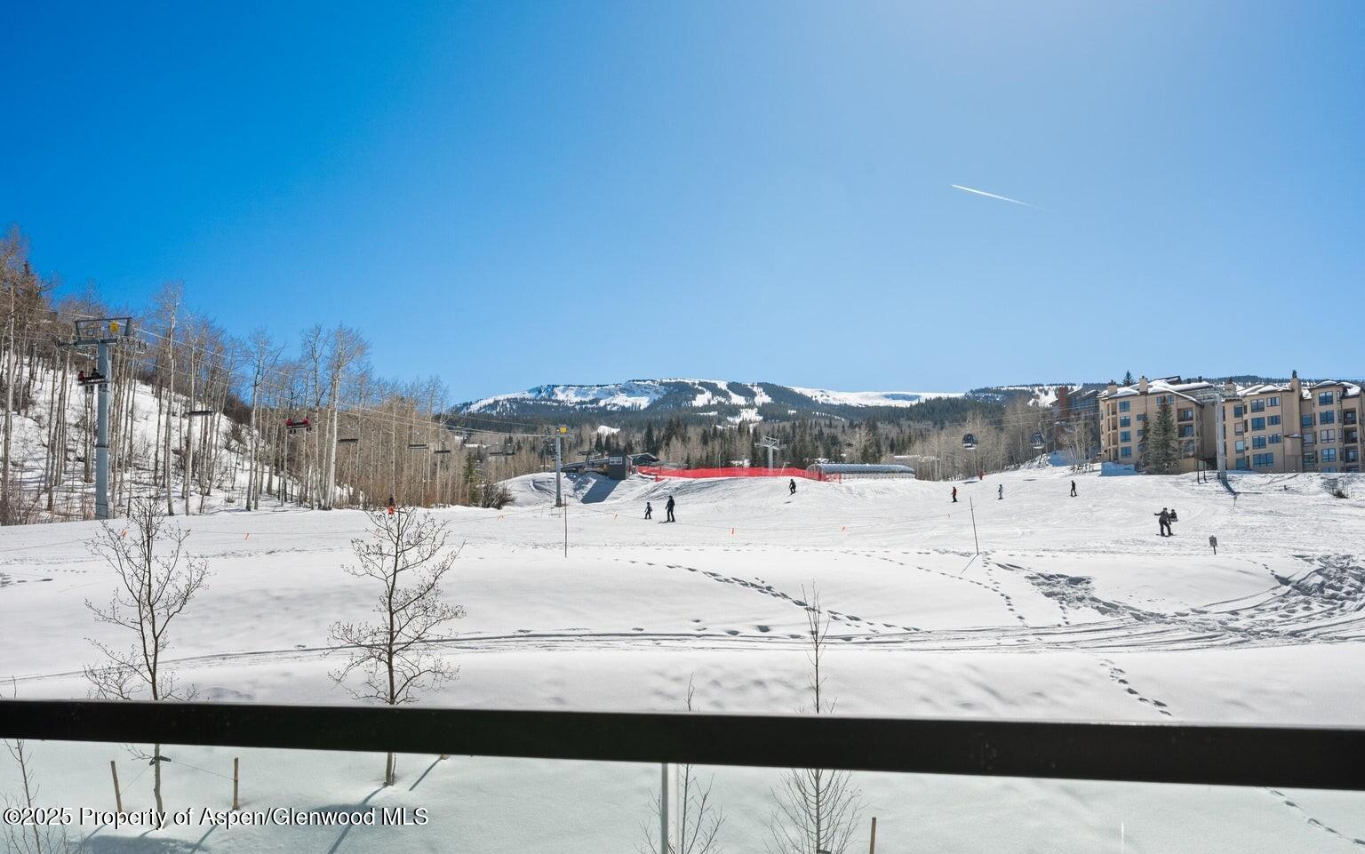 180 Wood Road, Unit 404 Snowmass Village, CO 81615 - Photo 5 of 51 a view of swimming pool with furniture