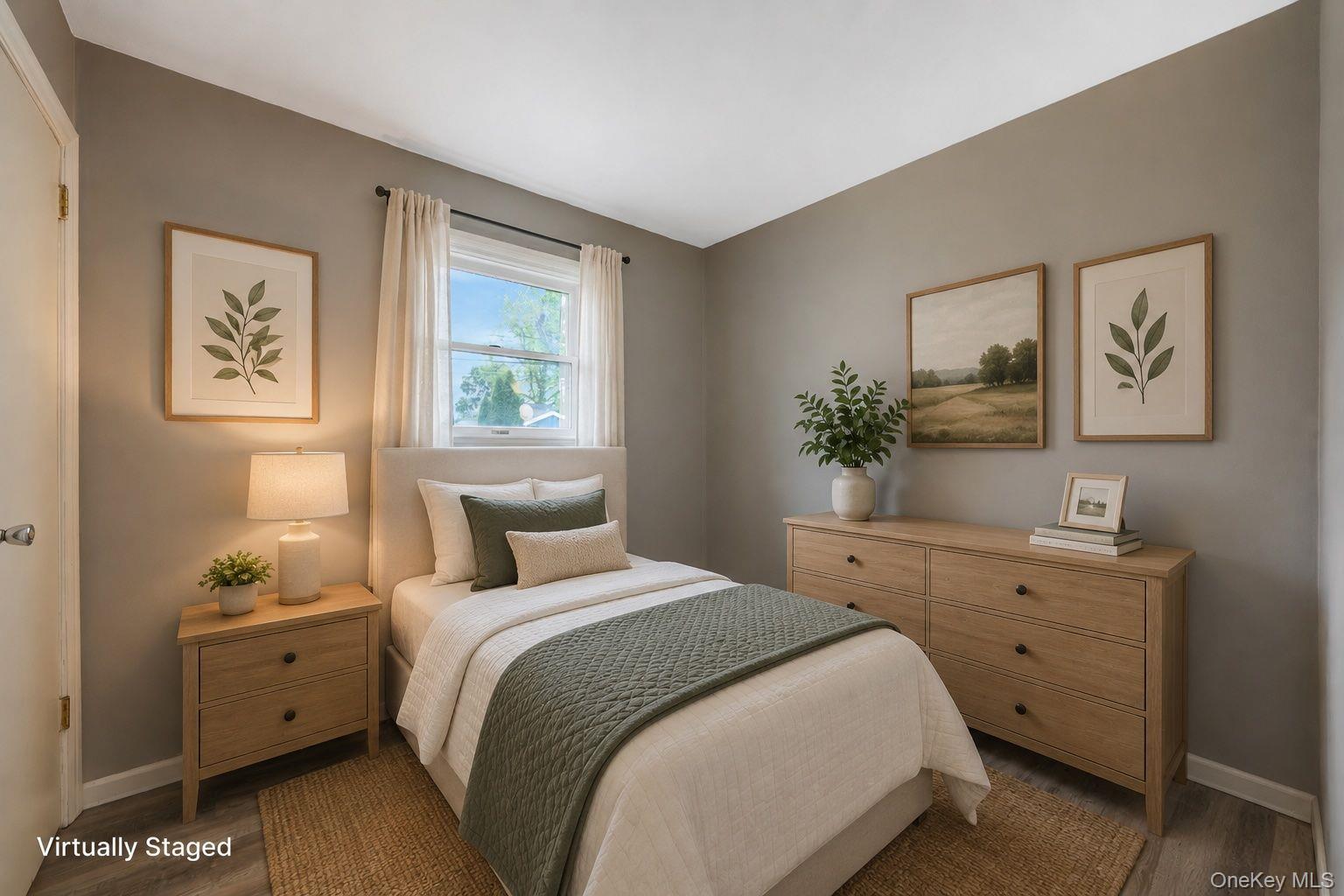 29 Franklin Street Islip, NY 11751 - Photo 24 of 39 a bedroom with a bed and a potted plant