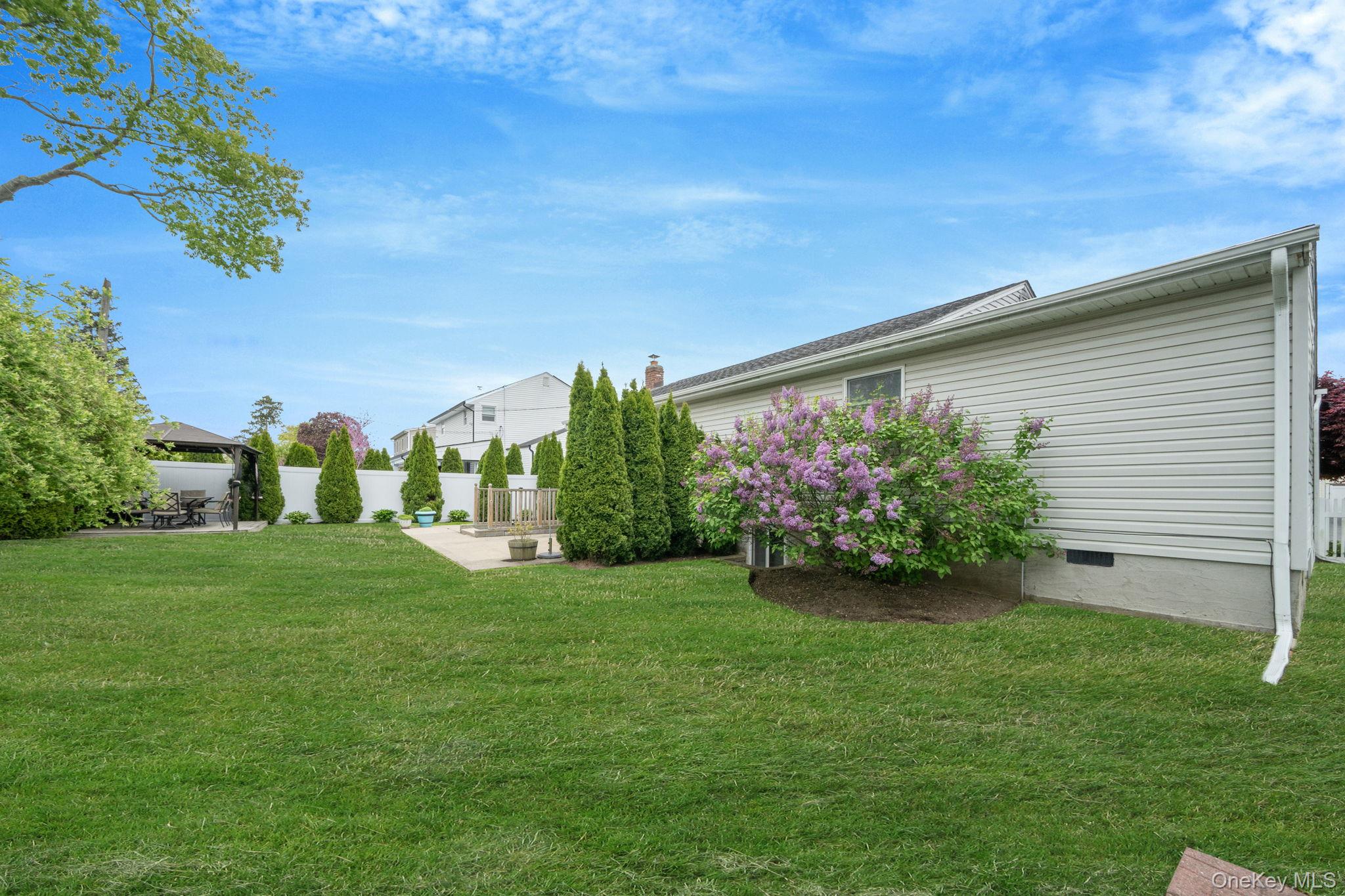 29 Franklin Street Islip, NY 11751 - Photo 33 of 39 a house view with a garden space