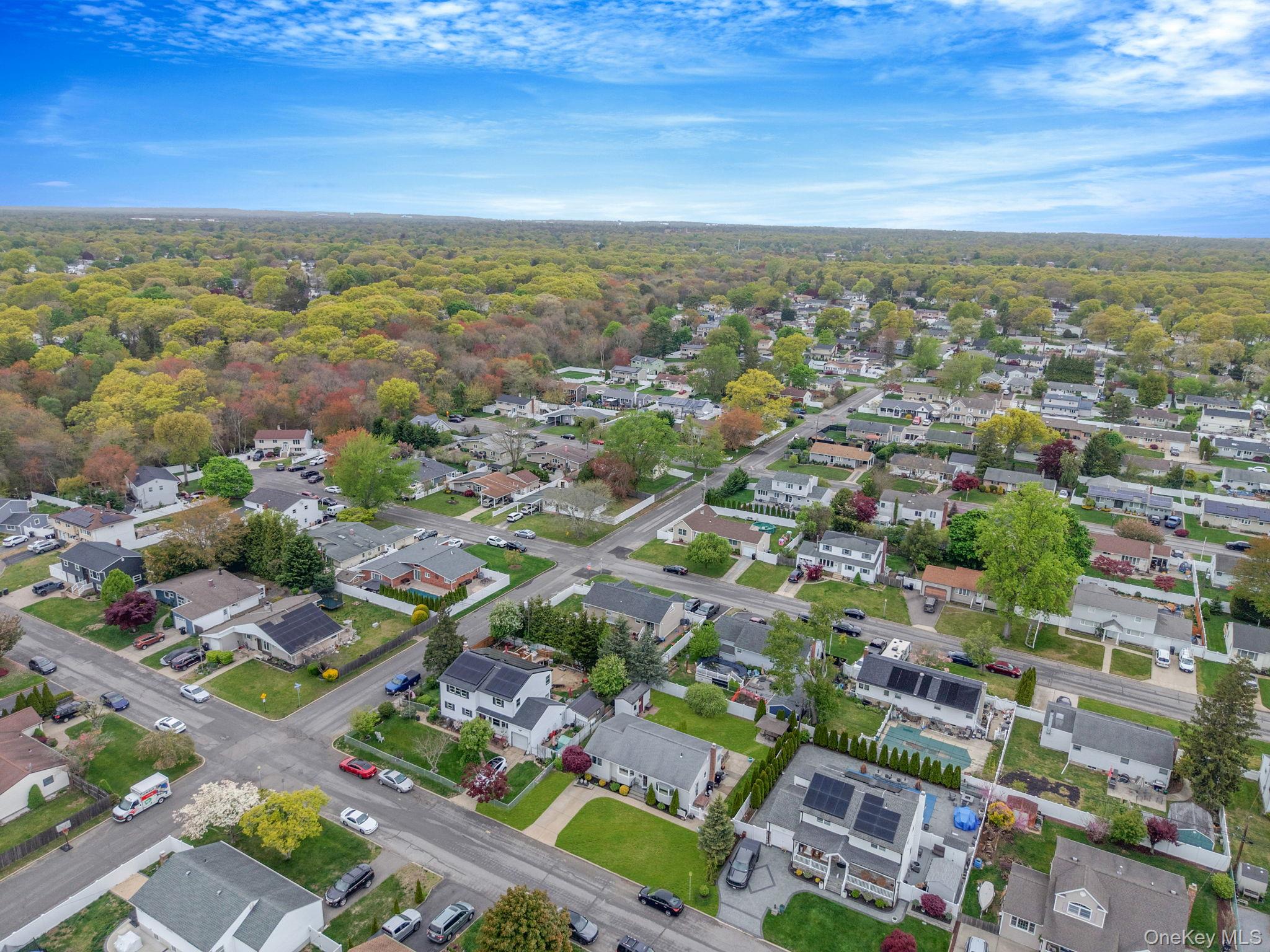 29 Franklin Street Islip, NY 11751 - Photo 38 of 39 an aerial view of residential building with green space