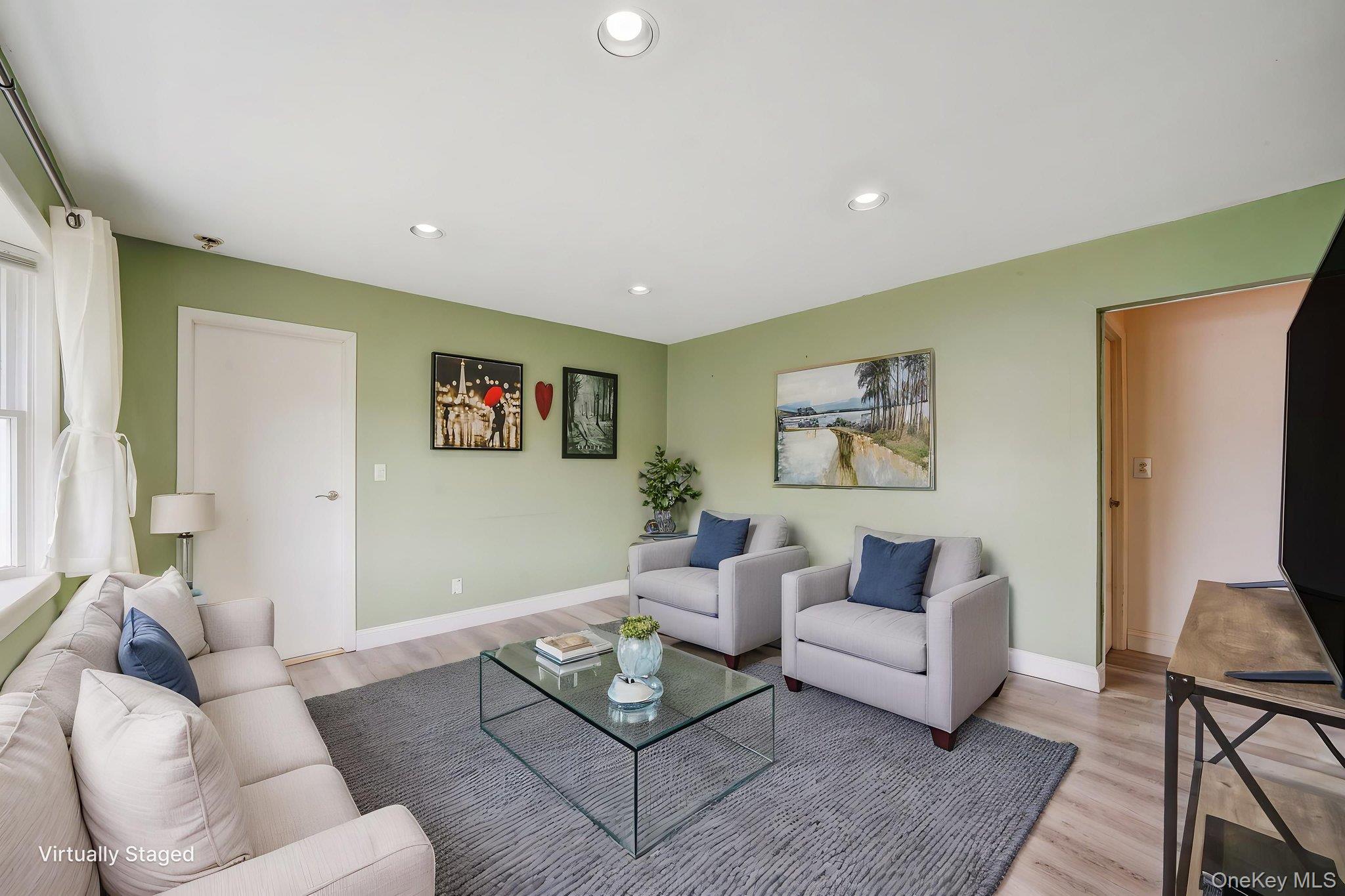 29 Franklin Street Islip, NY 11751 - Photo 6 of 39 a living room with furniture and a couch