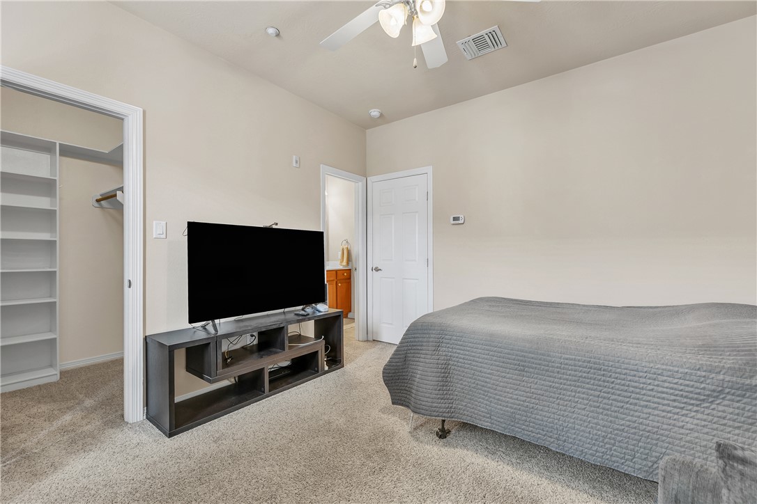 1198 Jones-Butler Road, Unit 2305 College Station, TX 77840 - Photo 13 of 25 a living room with flat screen tv and a couch