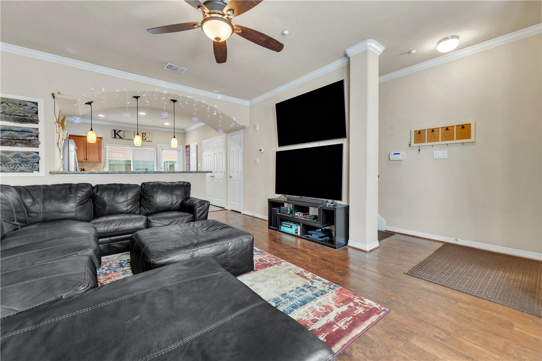 1198 Jones-Butler Road, Unit 2305 College Station, TX 77840 - Photo 5 of 25 a living room with furniture and a flat screen tv