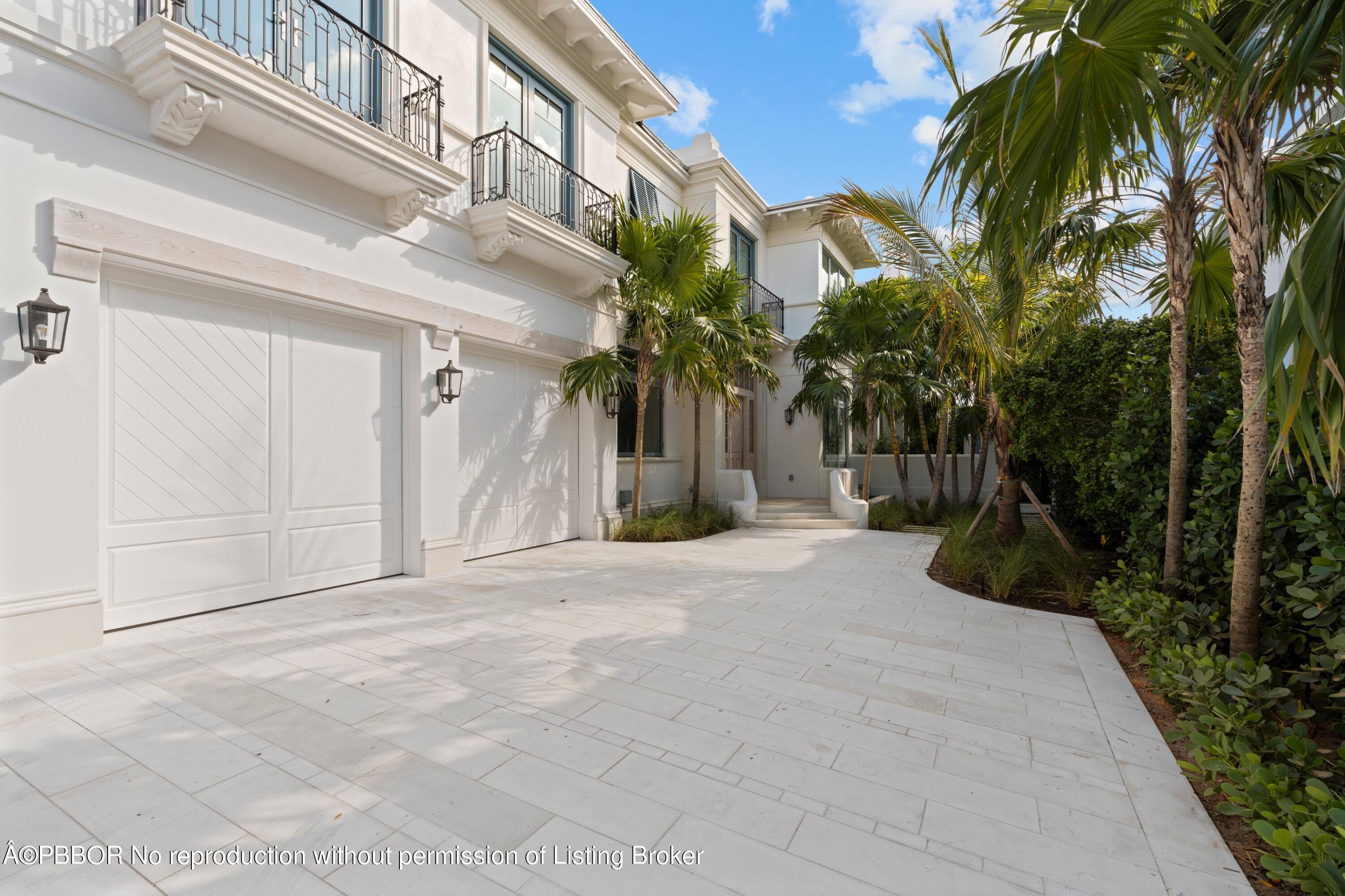 Undisclosed Address Palm Beach, FL 33480 - Photo 2 of 27 a view of a house with a yard