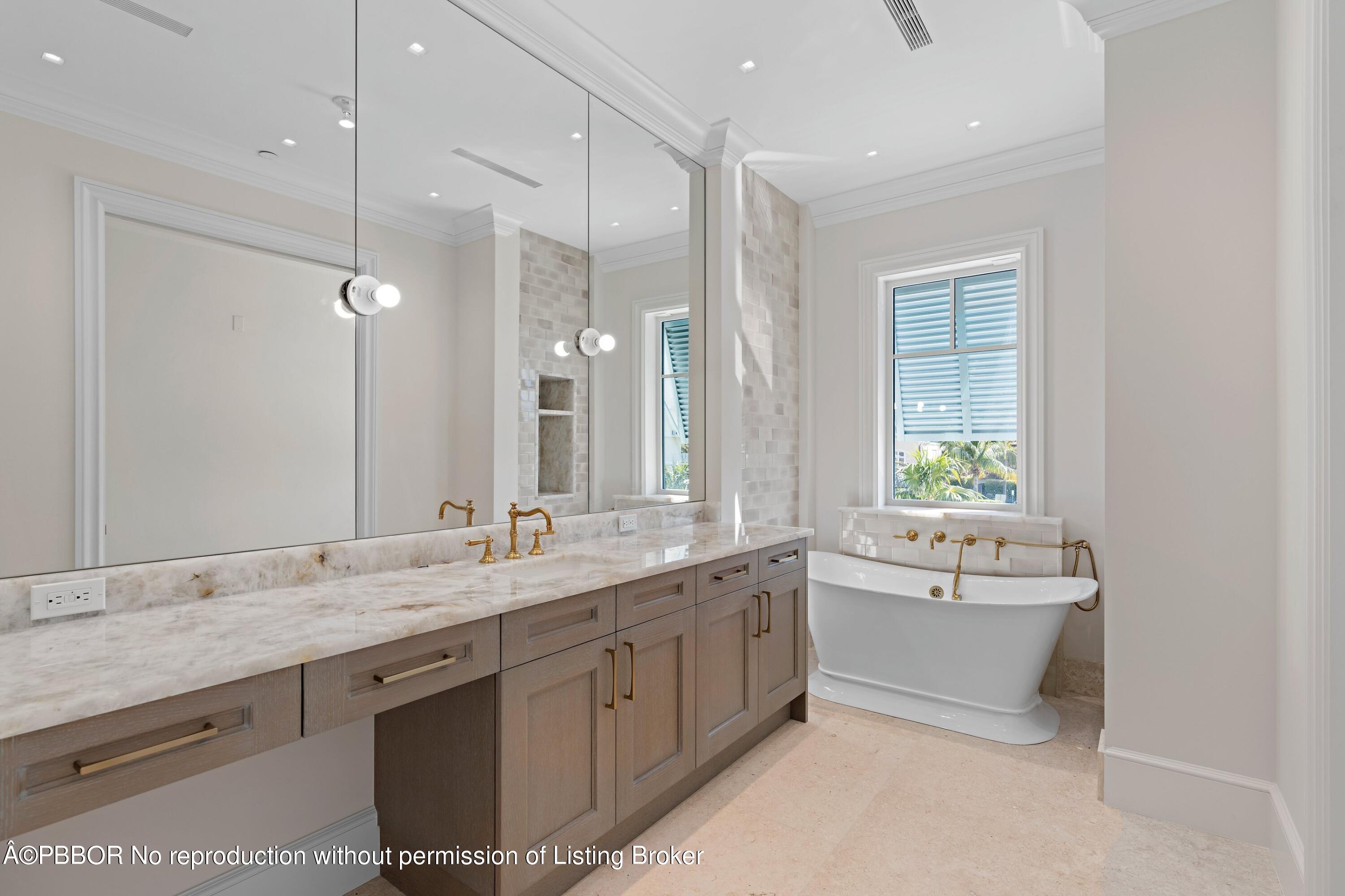 Undisclosed Address Palm Beach, FL 33480 - Photo 24 of 27 a bathroom with a granite countertop bathtub sink double and mirror