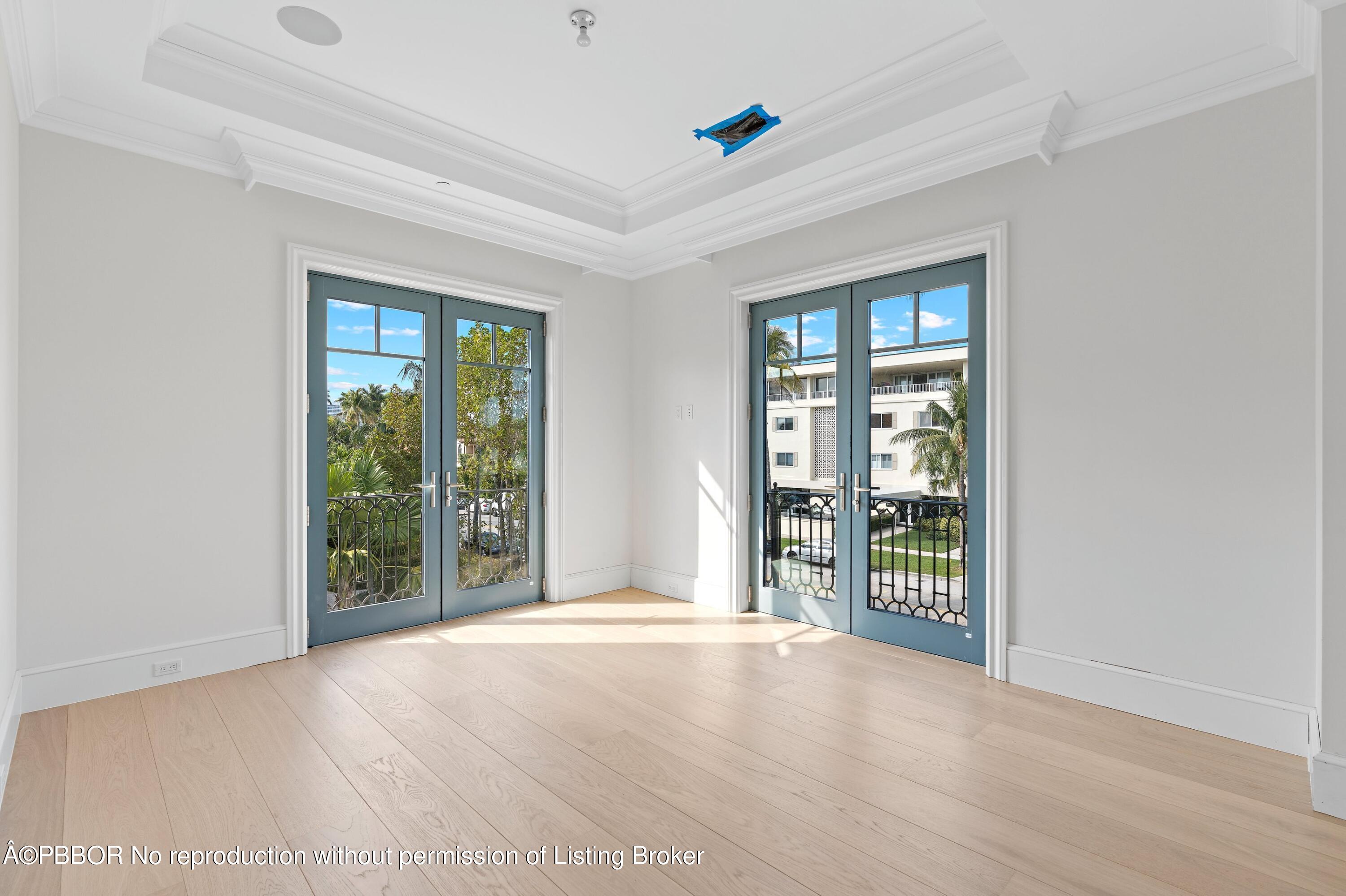 Undisclosed Address Palm Beach, FL 33480 - Photo 25 of 27 wooden floor and windows in an empty room