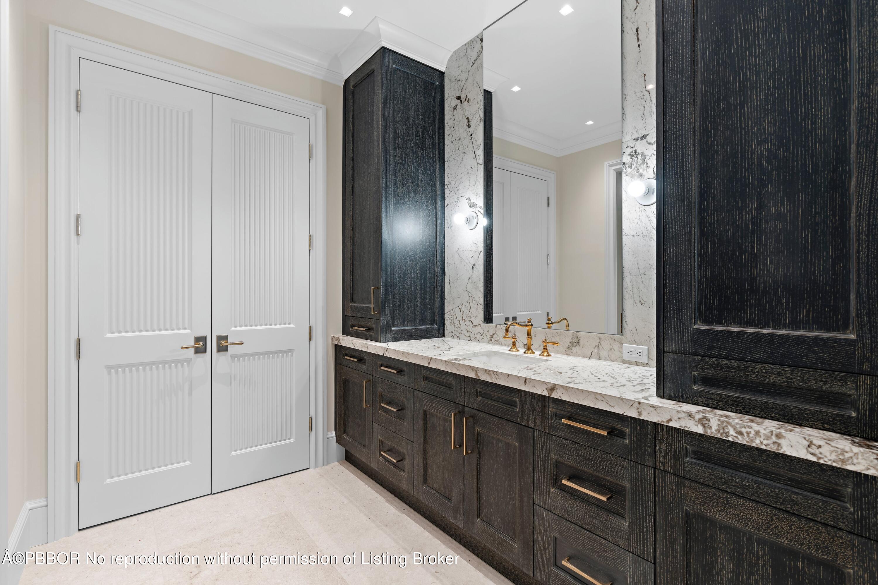 Undisclosed Address Palm Beach, FL 33480 - Photo 26 of 27 a bathroom with a double vanity sink and a mirror