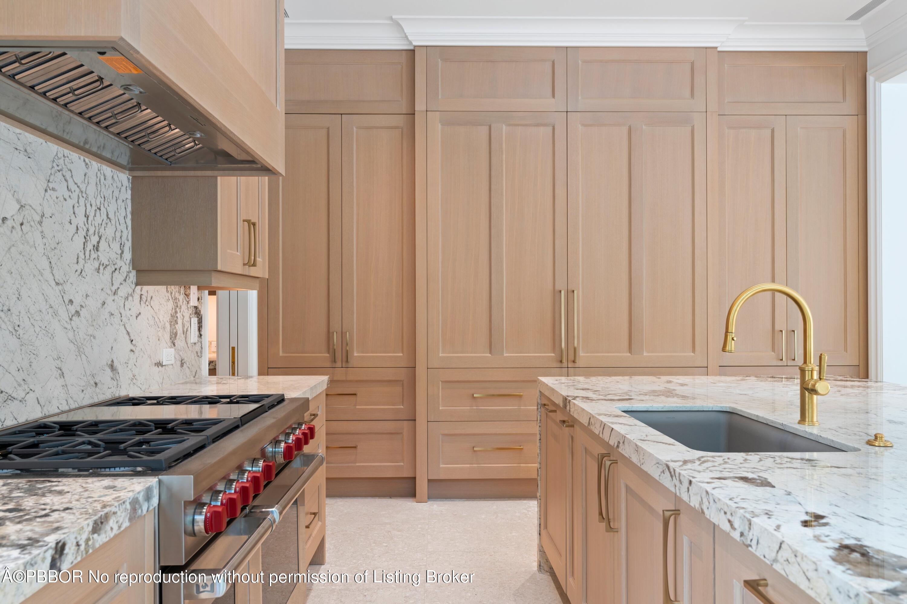 Undisclosed Address Palm Beach, FL 33480 - Photo 7 of 27 a kitchen that has a sink and a stove