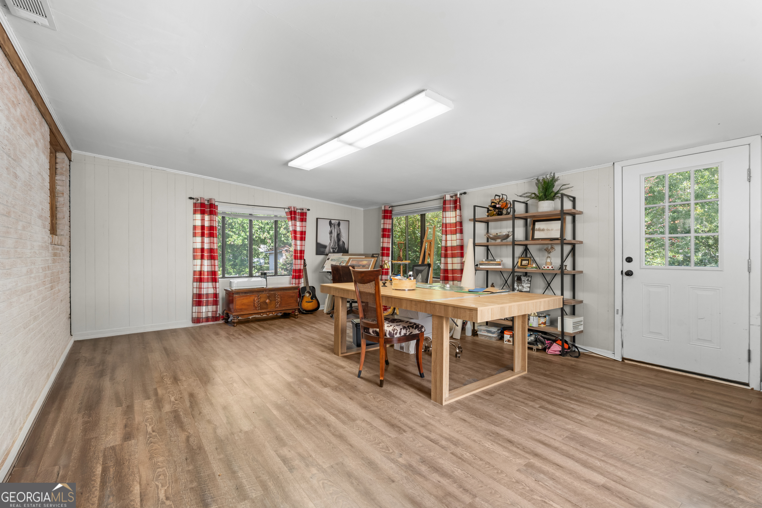 313 Gentilly Road Statesboro, GA 30458 - Photo 14 of 25 a view of a workspace with furniture and wooden floor