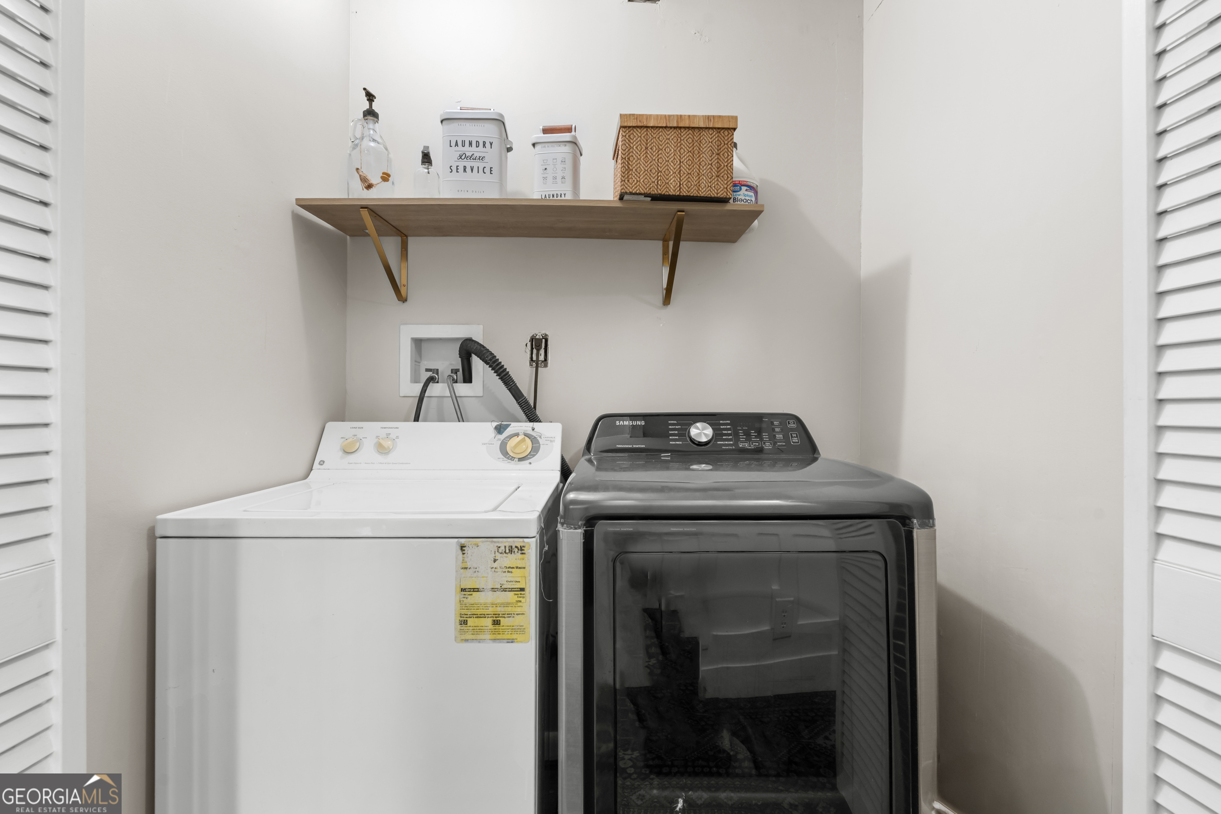 313 Gentilly Road Statesboro, GA 30458 - Photo 15 of 25 a utility room with dryer and washer