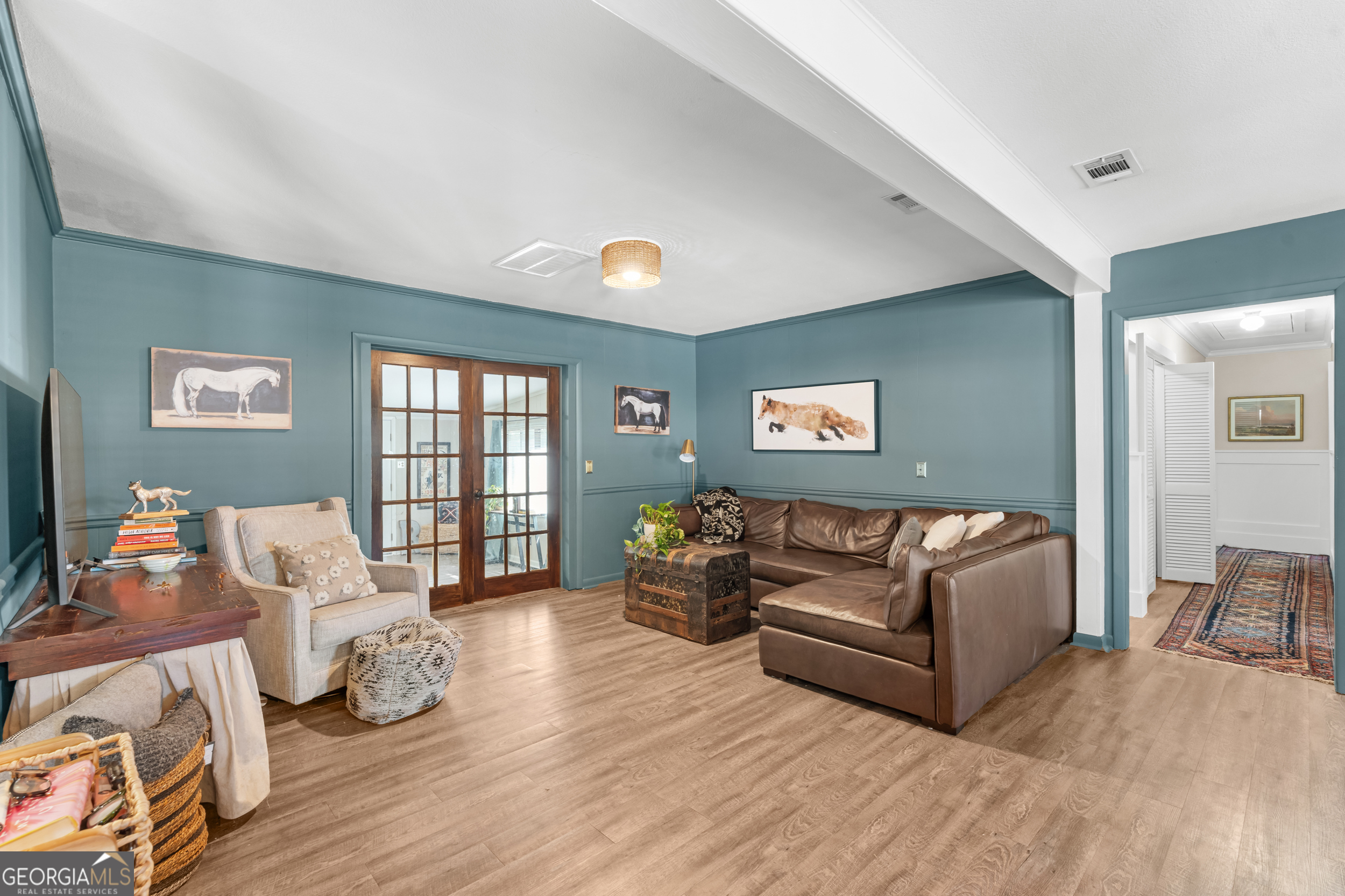 313 Gentilly Road Statesboro, GA 30458 - Photo 5 of 25 a living room with furniture and wooden floor