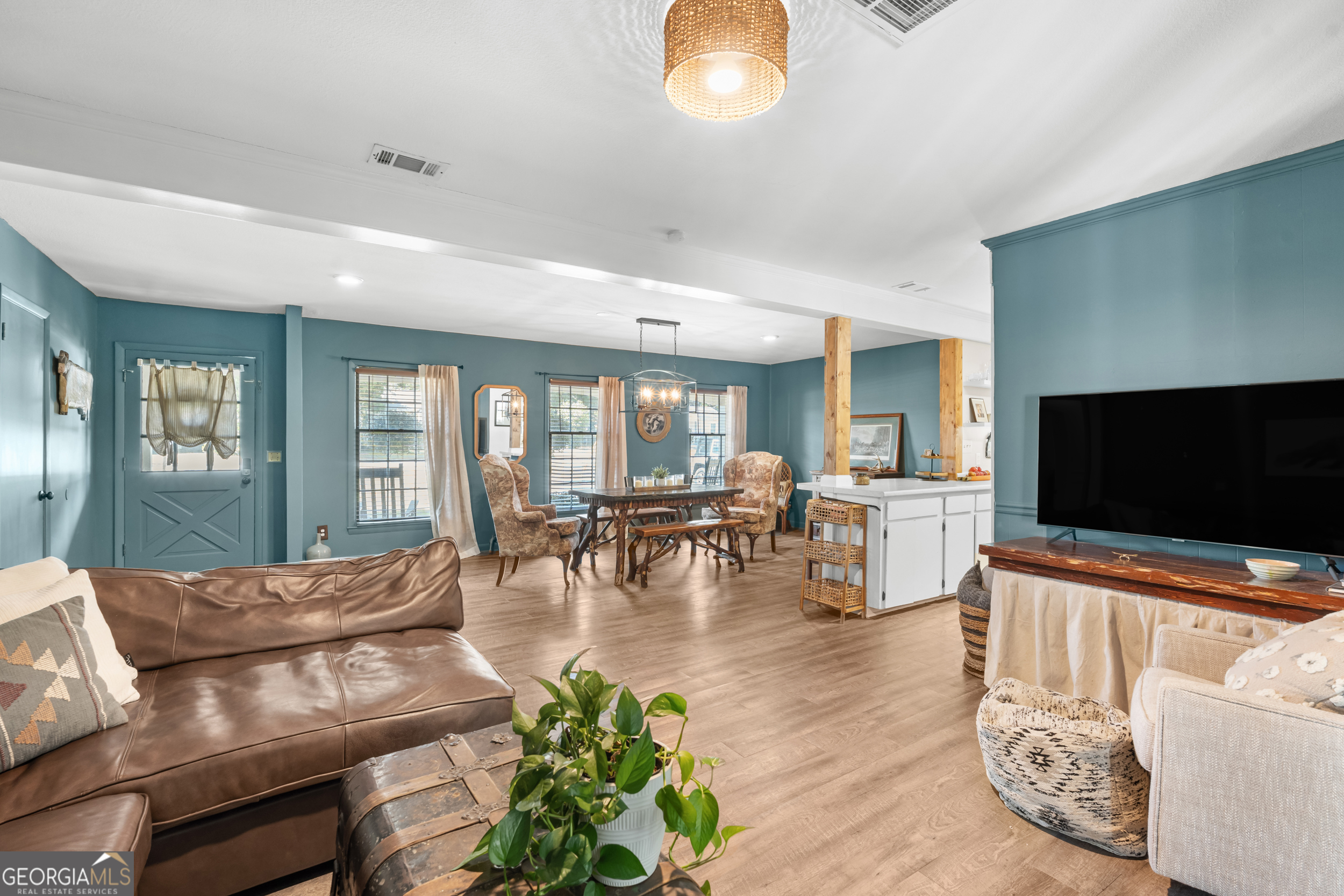 313 Gentilly Road Statesboro, GA 30458 - Photo 7 of 25 a living room with furniture and a flat screen tv