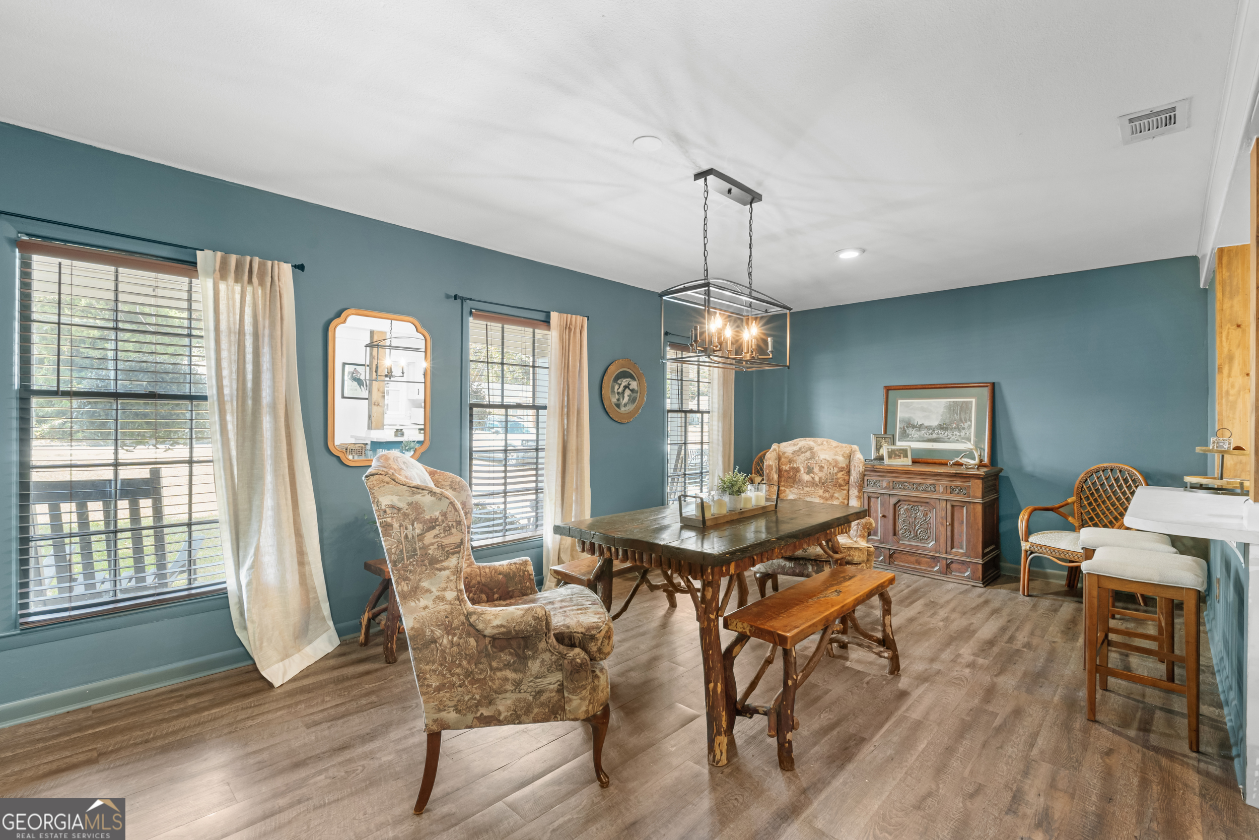 313 Gentilly Road Statesboro, GA 30458 - Photo 8 of 25 a living room with furniture chandelier and wooden floor