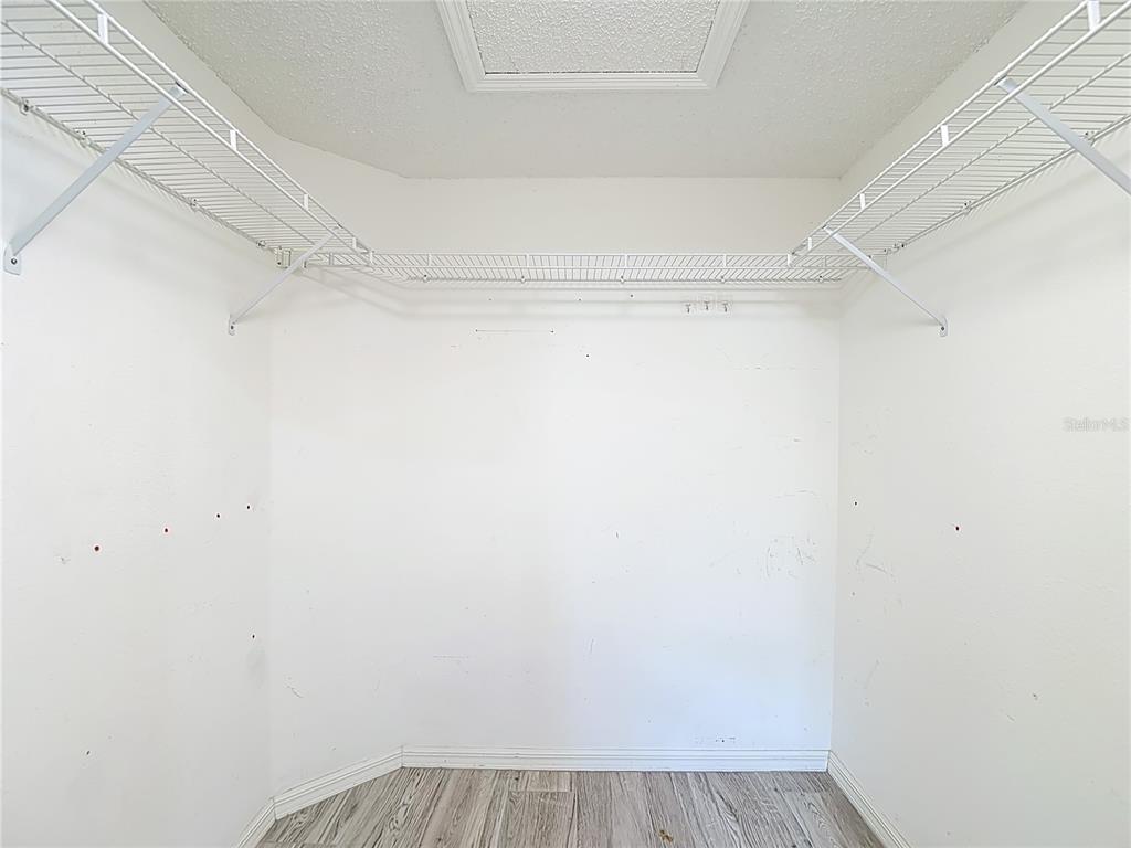 280 Quane Avenue Spring Hill, FL 34609 - Photo 29 of 62 a view of a room with racks on the wall