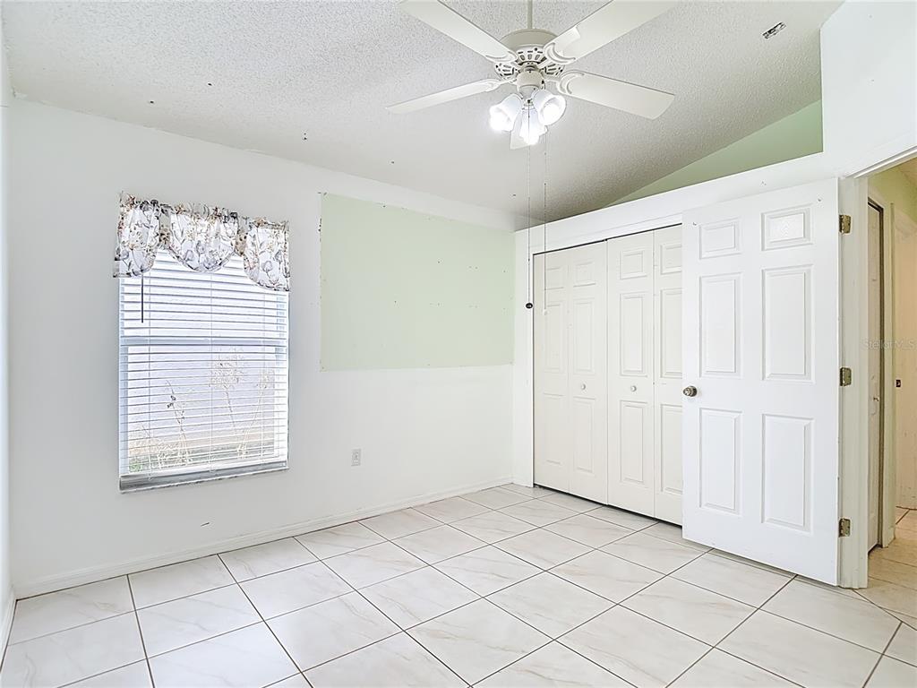 280 Quane Avenue Spring Hill, FL 34609 - Photo 35 of 62 a view of an empty room with a window