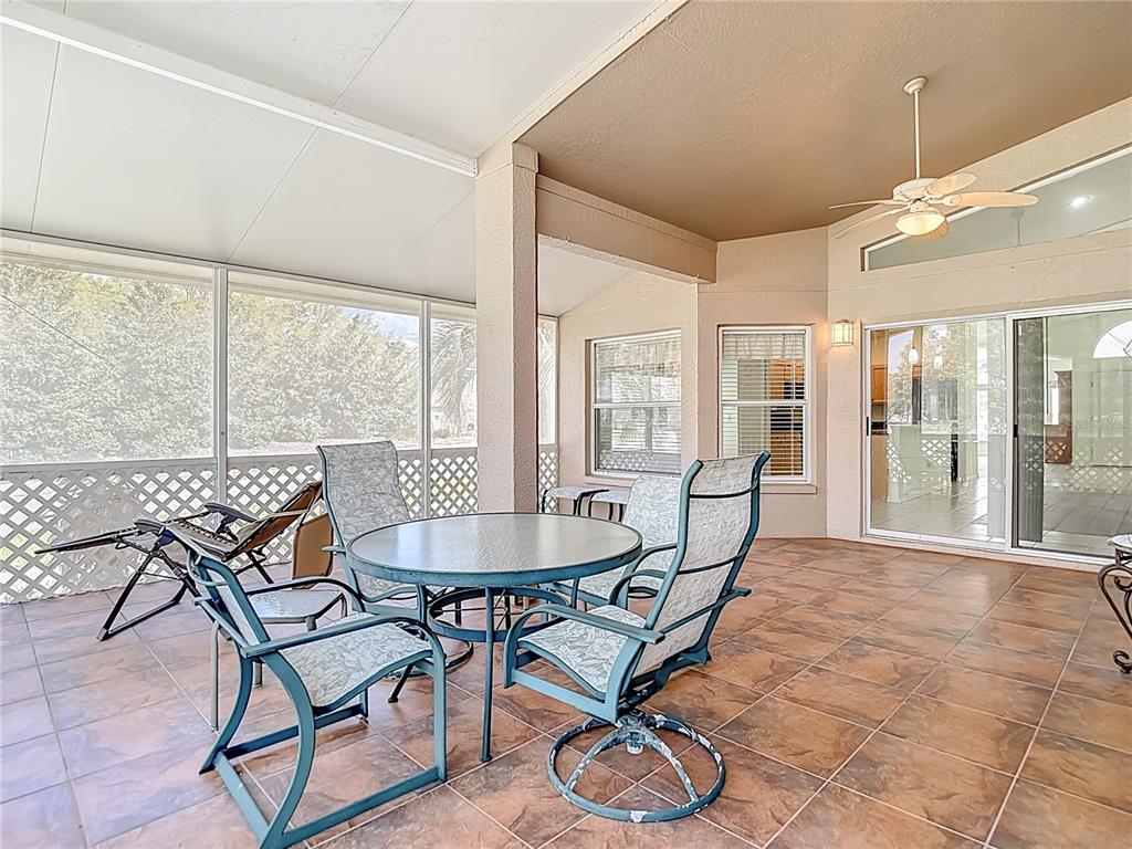 280 Quane Avenue Spring Hill, FL 34609 - Photo 46 of 62 a dining room with furniture and wooden floor