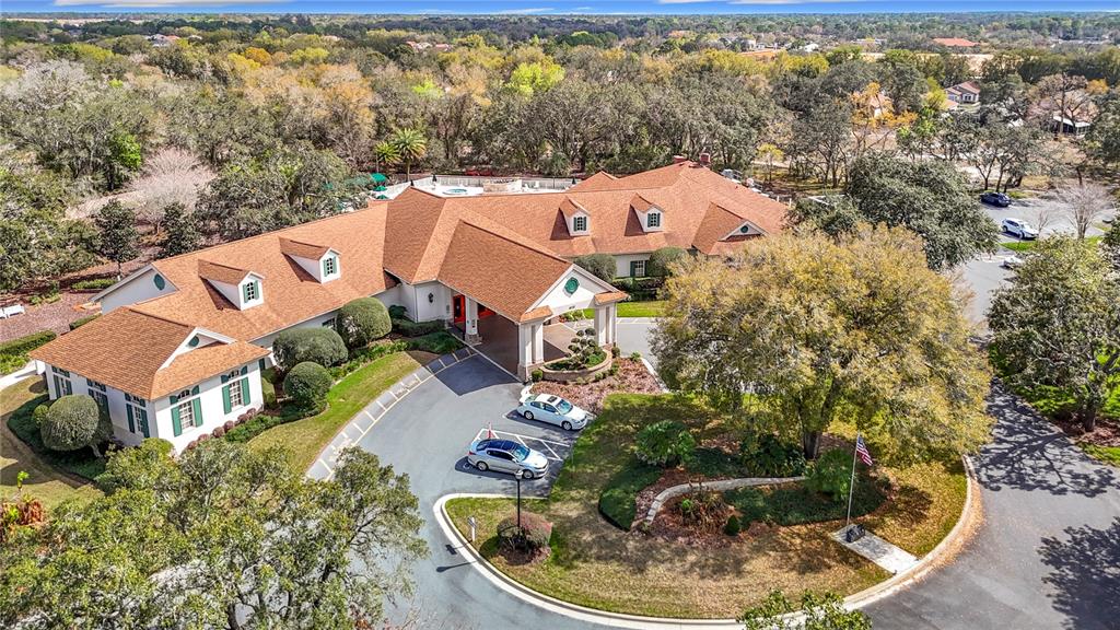 280 Quane Avenue Spring Hill, FL 34609 - Photo 58 of 62 an aerial view of a house with a swimming pool