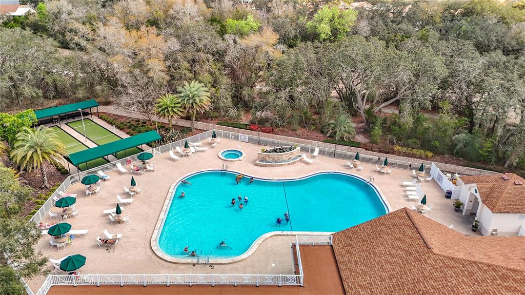 280 Quane Avenue Spring Hill, FL 34609 - Photo 59 of 62 an aerial view of a house with a swimming pool