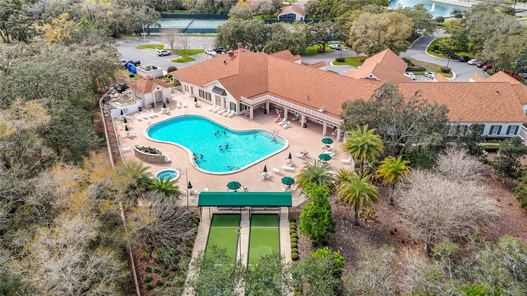 280 Quane Avenue Spring Hill, FL 34609 - Photo 61 of 62 an aerial view of a house with a swimming pool outdoor seating and yard