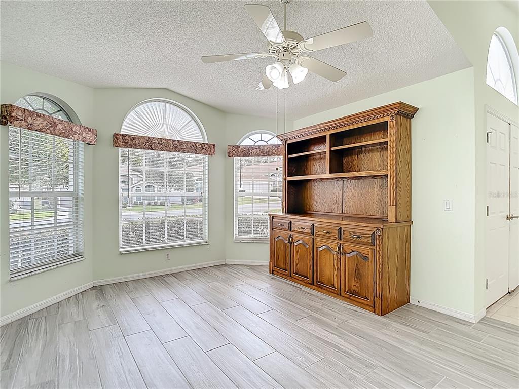 280 Quane Avenue Spring Hill, FL 34609 - Photo 7 of 62 a view of cabinet with wooden floor and cabinet