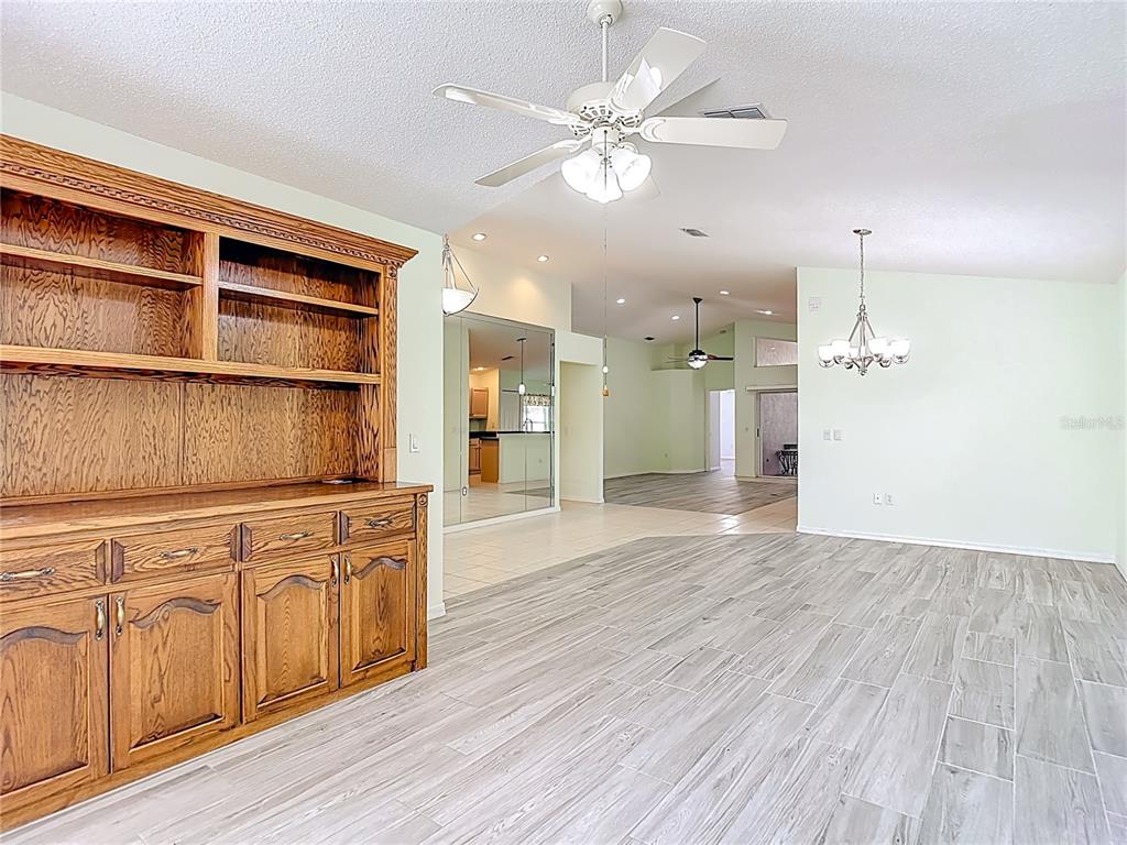280 Quane Avenue Spring Hill, FL 34609 - Photo 8 of 62 a view of an empty room with a kitchen