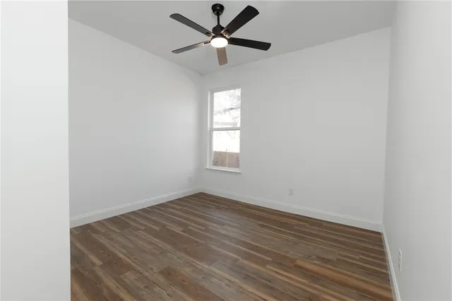 a view of a kitchen with windows