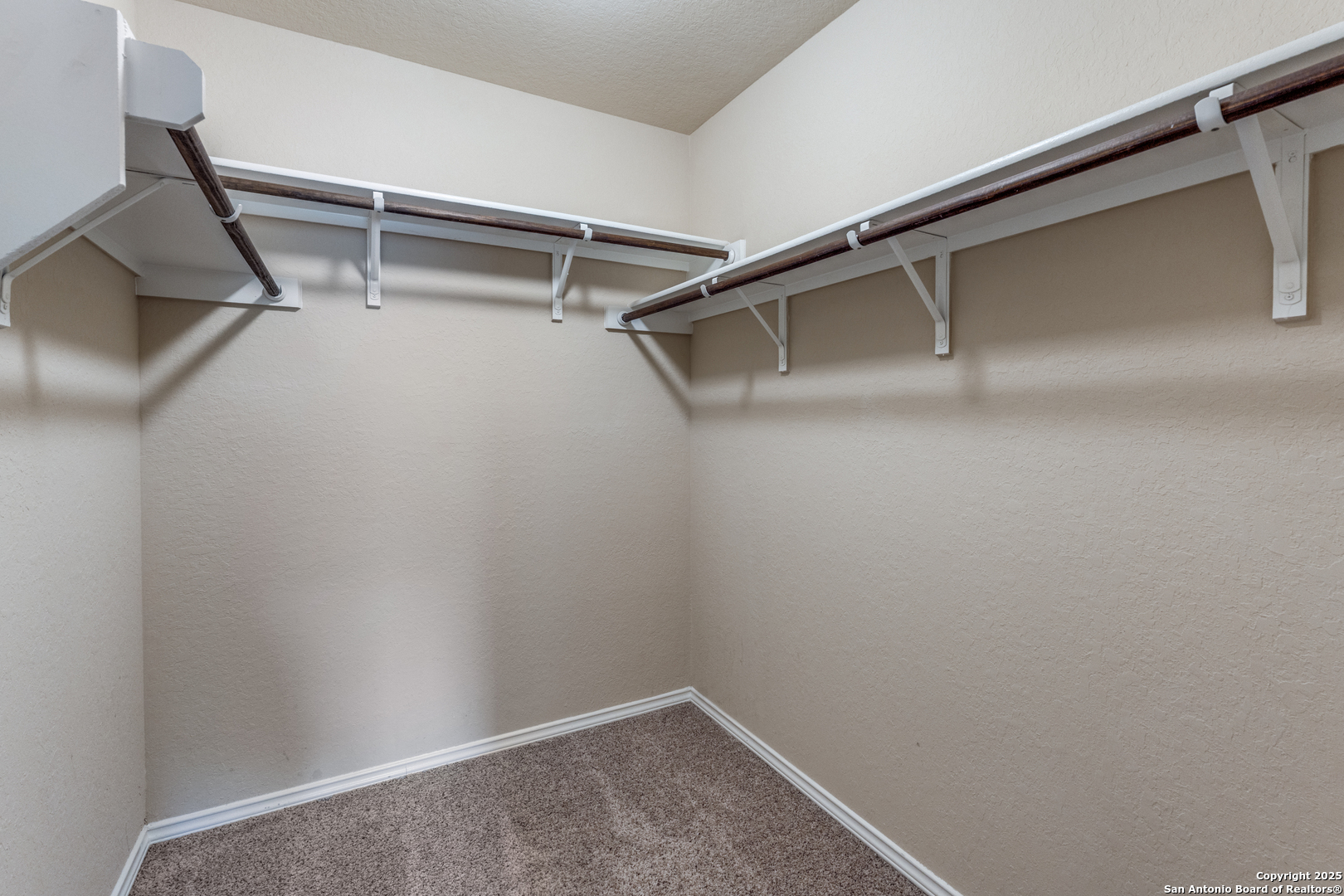 5102 Everett Loop Converse, TX 78109 - Photo 14 of 24 a view of an empty walk in closet