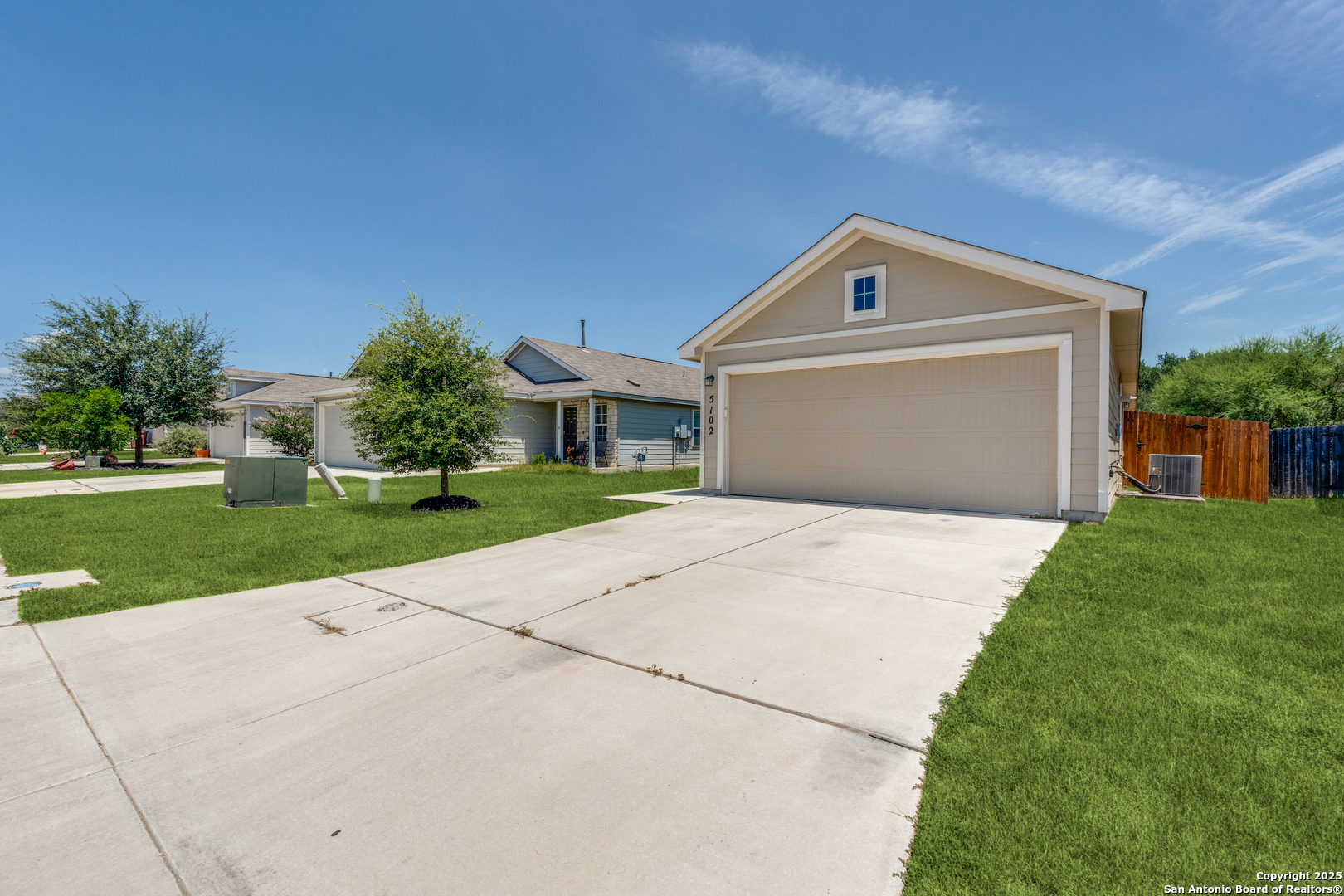 5102 Everett Loop Converse, TX 78109 - Photo 4 of 24 a front view of a house with a yard