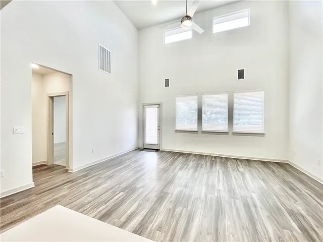 a kitchen with a sink stove and refrigerator