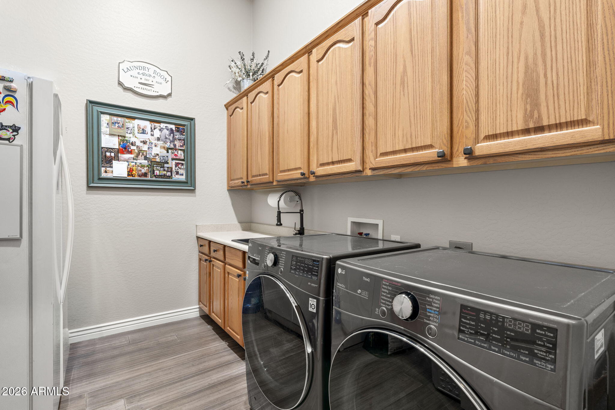 41619 North River Bend Road Anthem, AZ 85086 - Photo 24 of 84 a utility room with dryer and washer