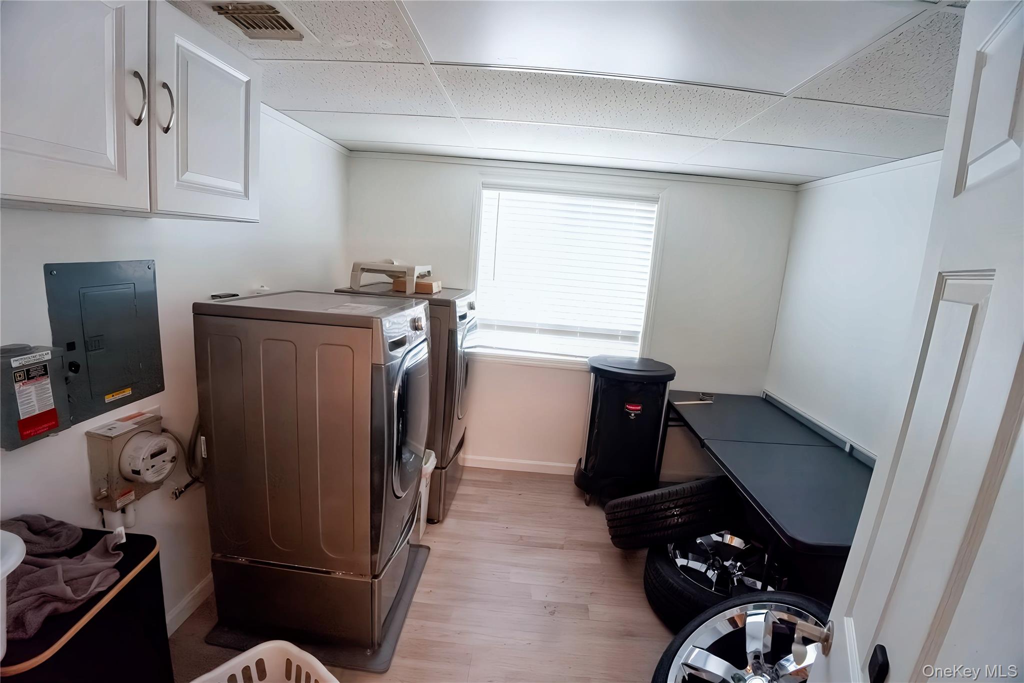 165 Randall Road Shoreham, NY 11786 - Photo 24 of 31 Laundry room with storage