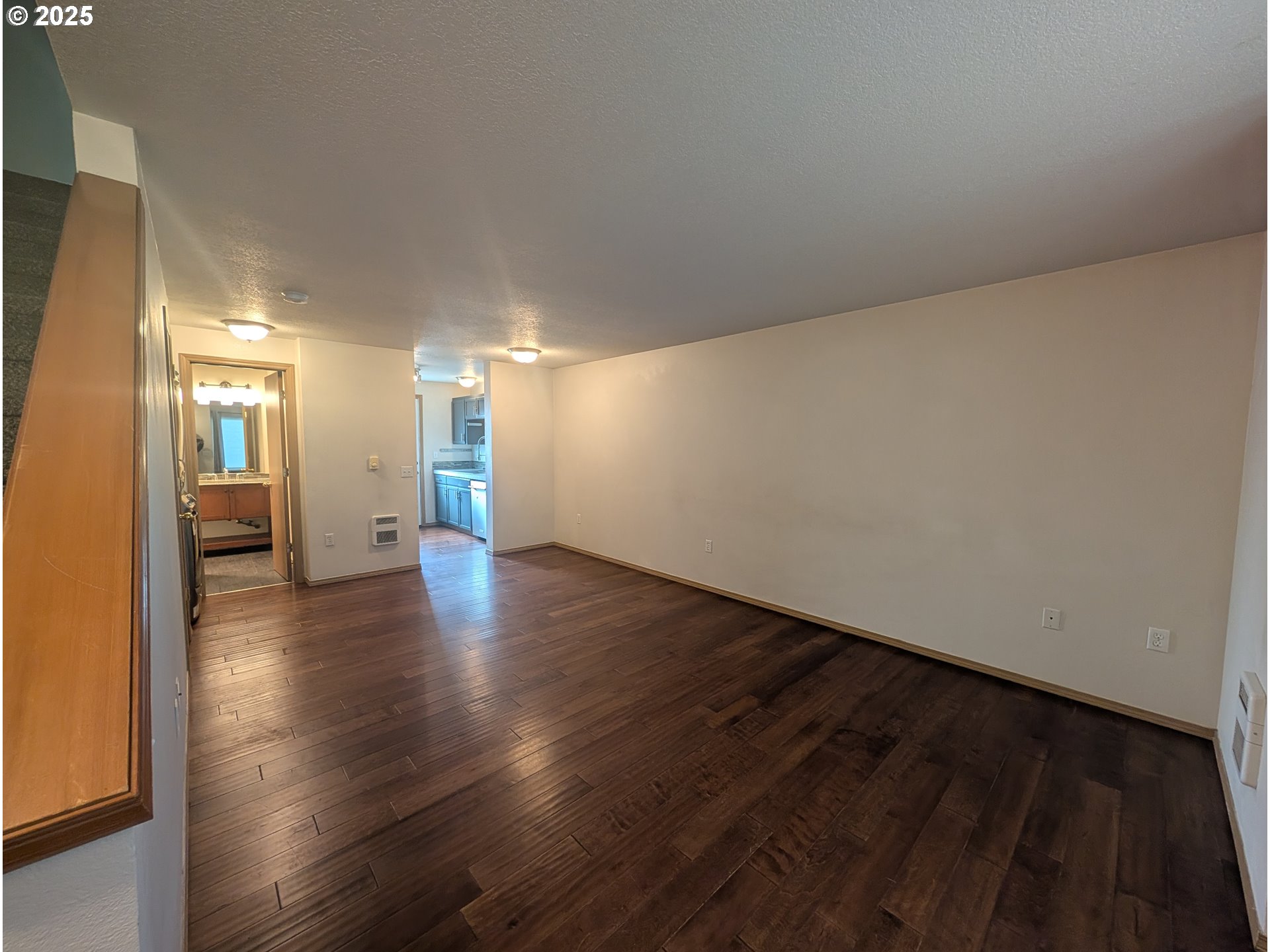 2501 East 2nd Street Newberg, OR 97132 - Photo 14 of 18 a view of a hallway with wooden floor