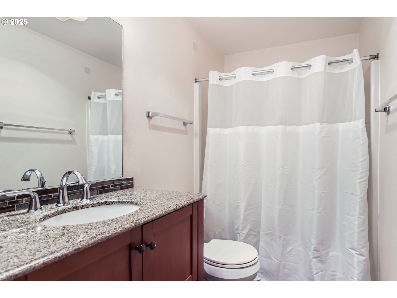 2501 East 2nd Street Newberg, OR 97132 - Photo 7 of 18 a bathroom with a granite countertop sink toilet and shower