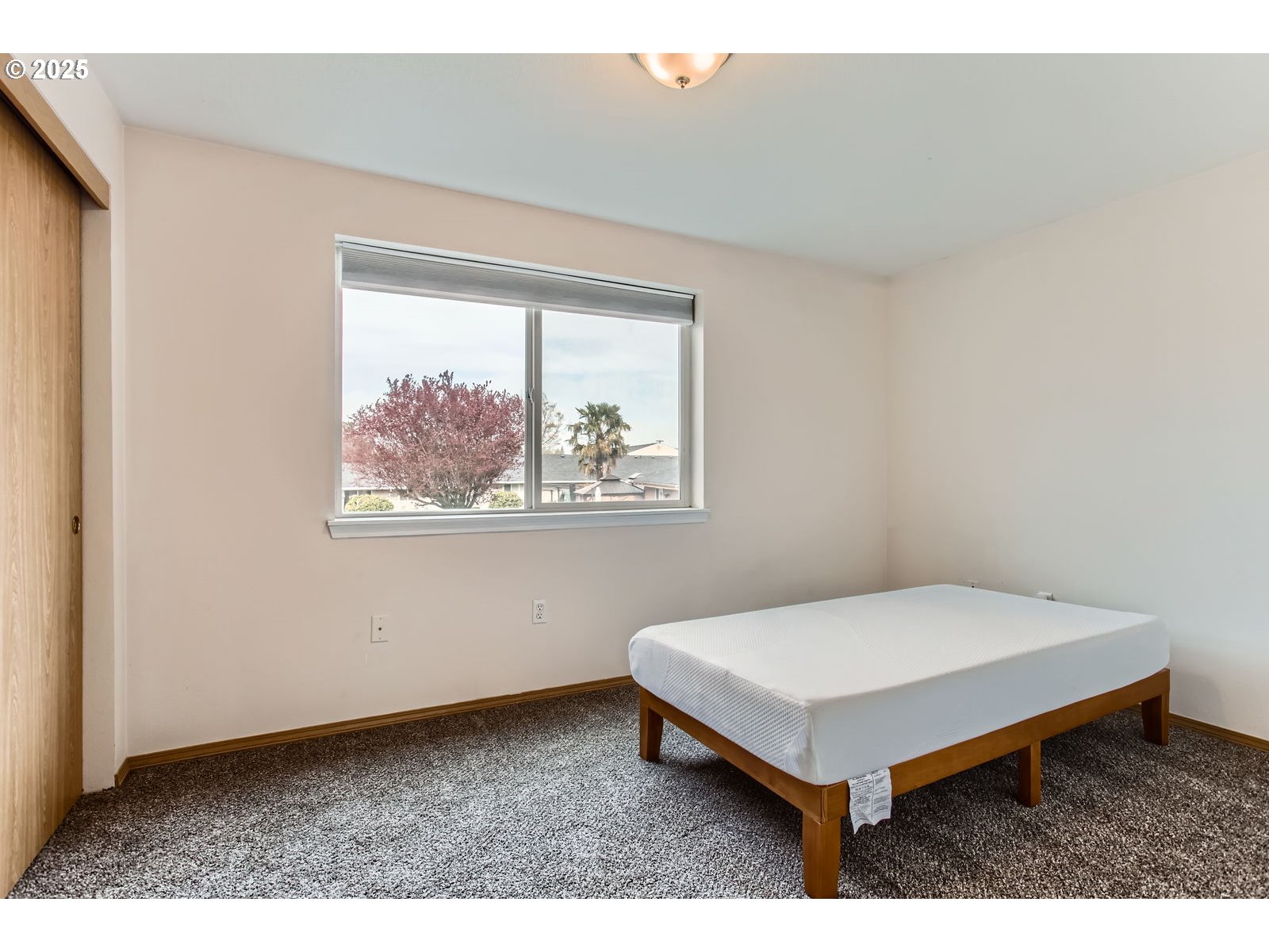 2501 East 2nd Street Newberg, OR 97132 - Photo 9 of 18 a white house sitting next to a white wall