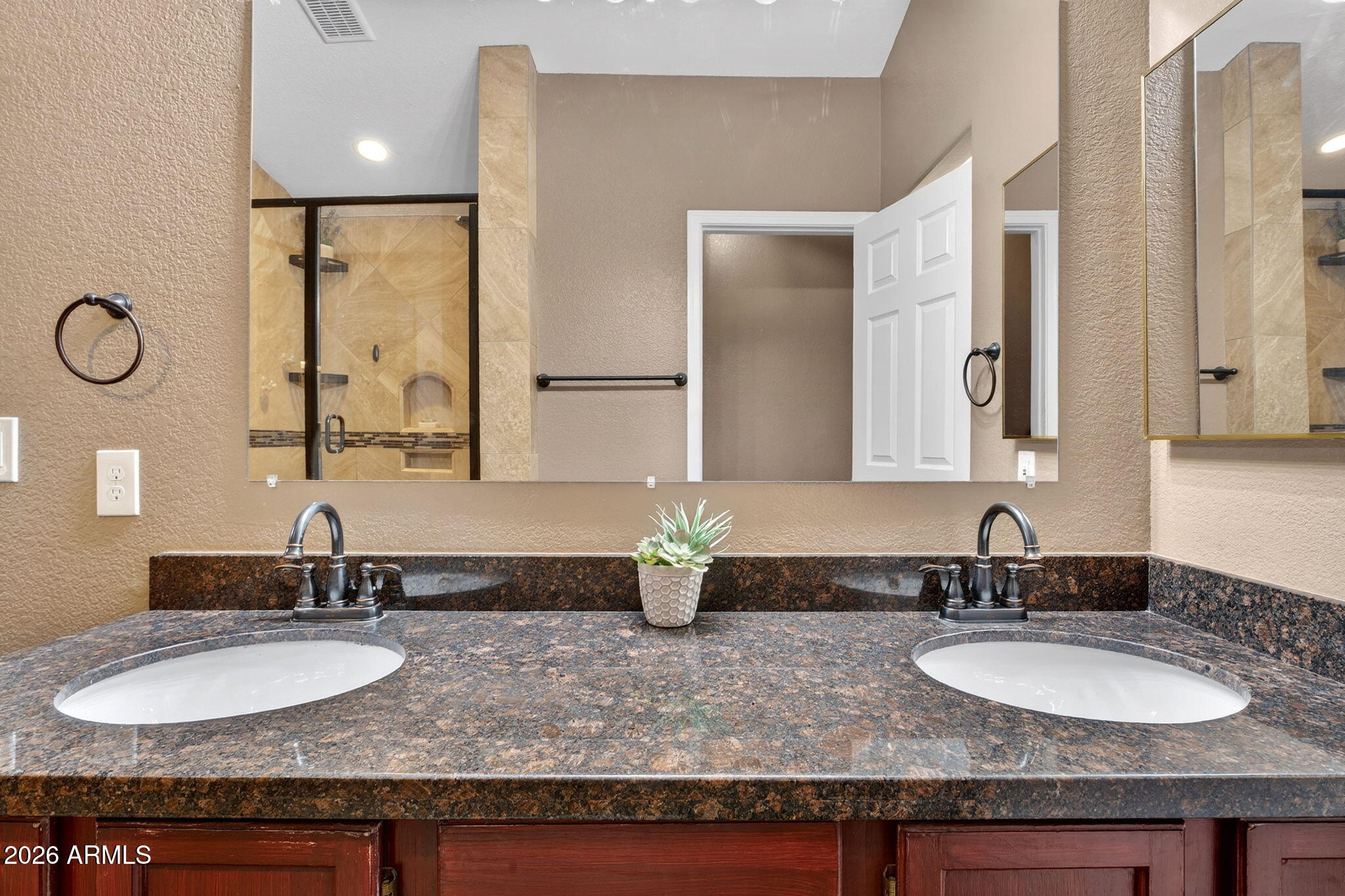 3242 North Ricardo Circle Mesa, AZ 85215 - Photo 32 of 79 a bathroom with double sink and a mirror