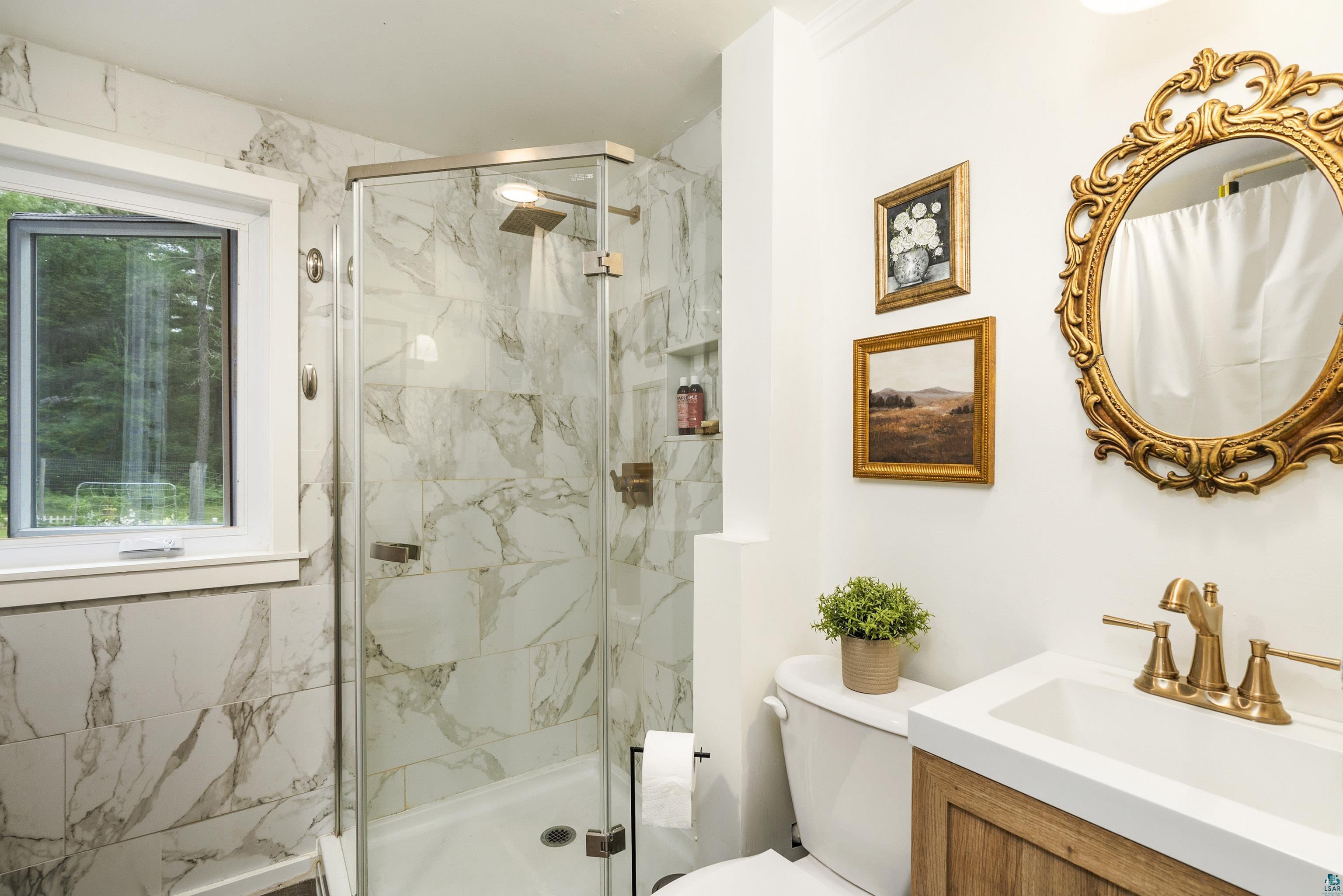 6345 Smith Lake Road Barnes, WI 54873 - Photo 26 of 50 Bathroom featuring a shower with door, toilet, and vanity