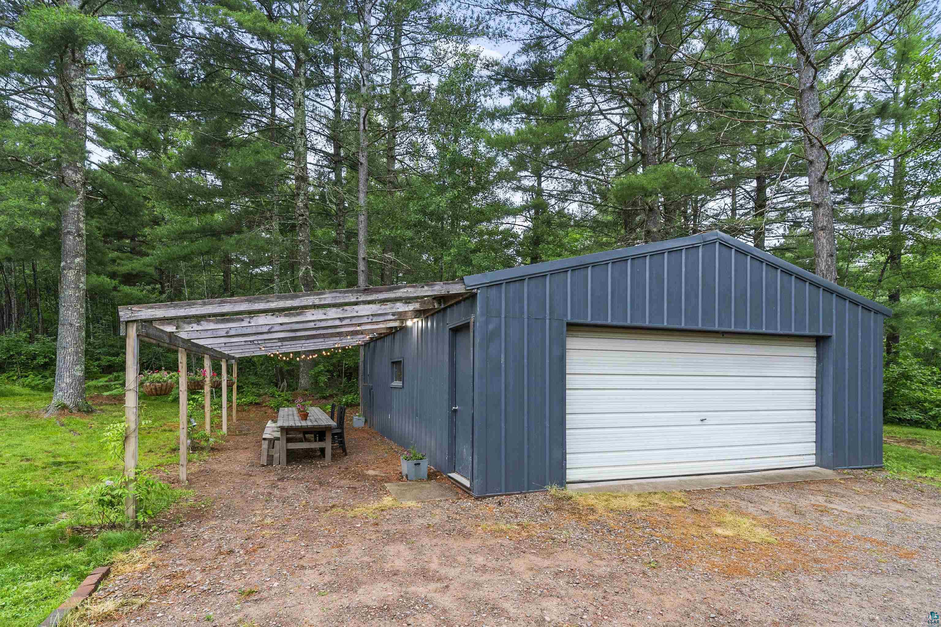 6345 Smith Lake Road Barnes, WI 54873 - Photo 40 of 50 Garage featuring a carport
