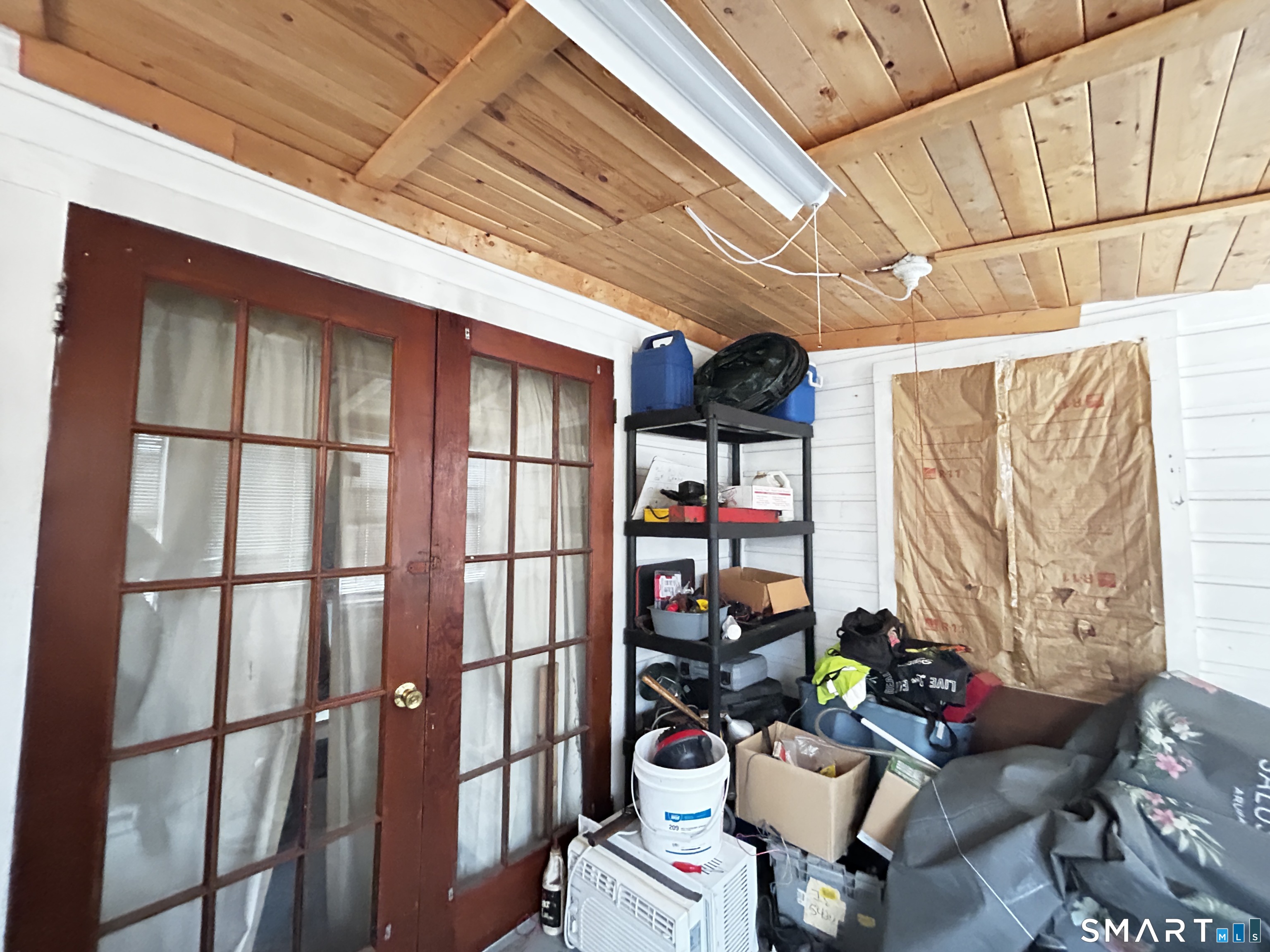 267 Sandy Beach Road Ellington, CT 06029 - Photo 8 of 11 Enclosed covered porch