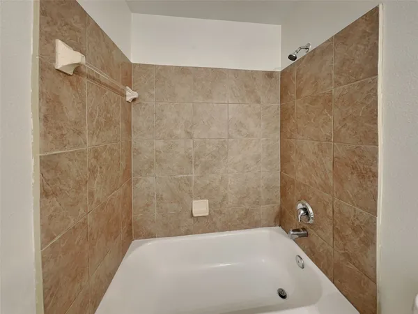 a bathroom with a bathtub