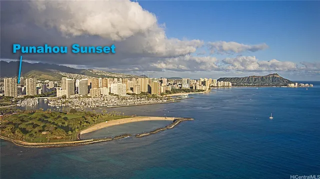 a view of a swimming pool with an outdoor seating