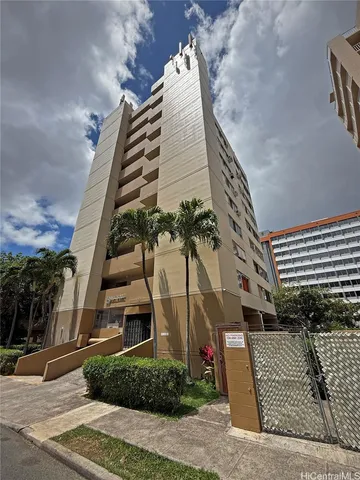 a view of a water fountain in front of the house