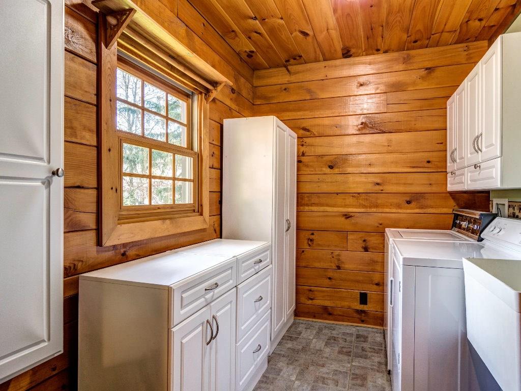 228 Goldscheitter Road Sarver, PA 16055 - Photo 8 of 22 Large Laundry Room has everything, even a built-in Ironing Board