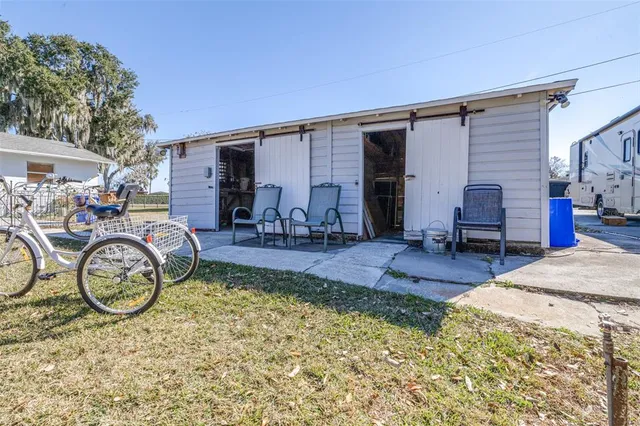 a couple of bicycles parked in front of house
